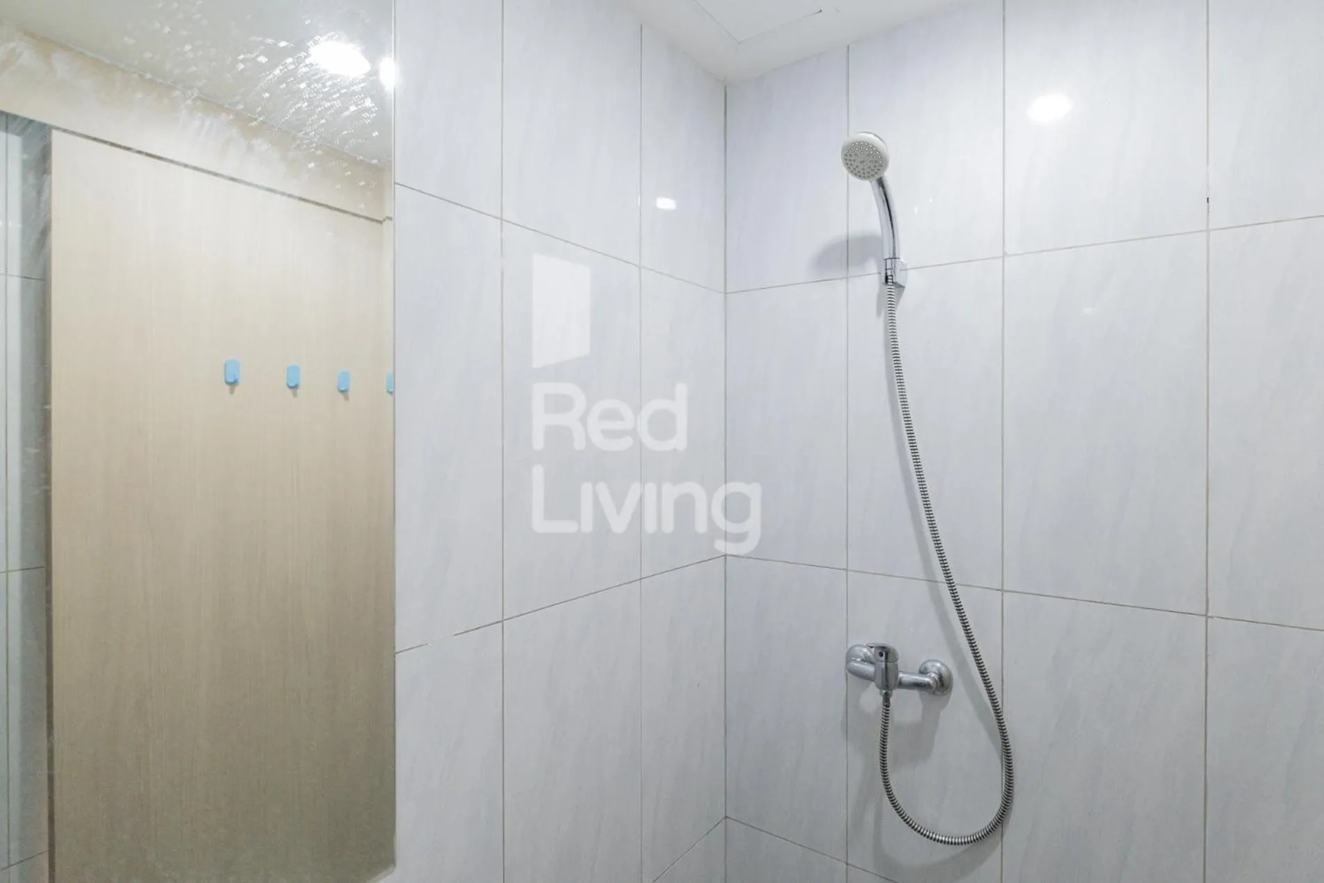 Bathroom in RedLiving Apartemen Jakarta Living Star - BoboRooms
