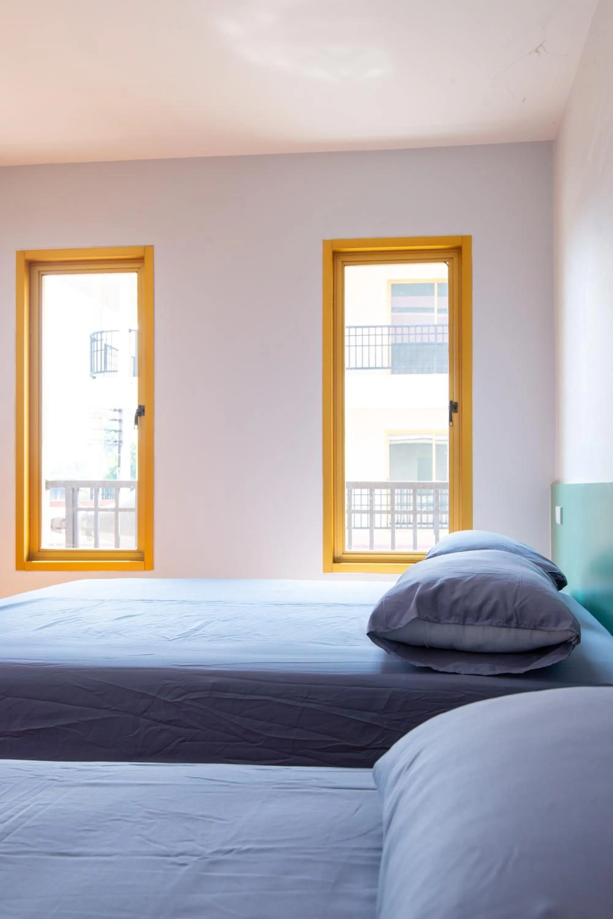 Bed in Chiang Kham Ruk Khun Hotel