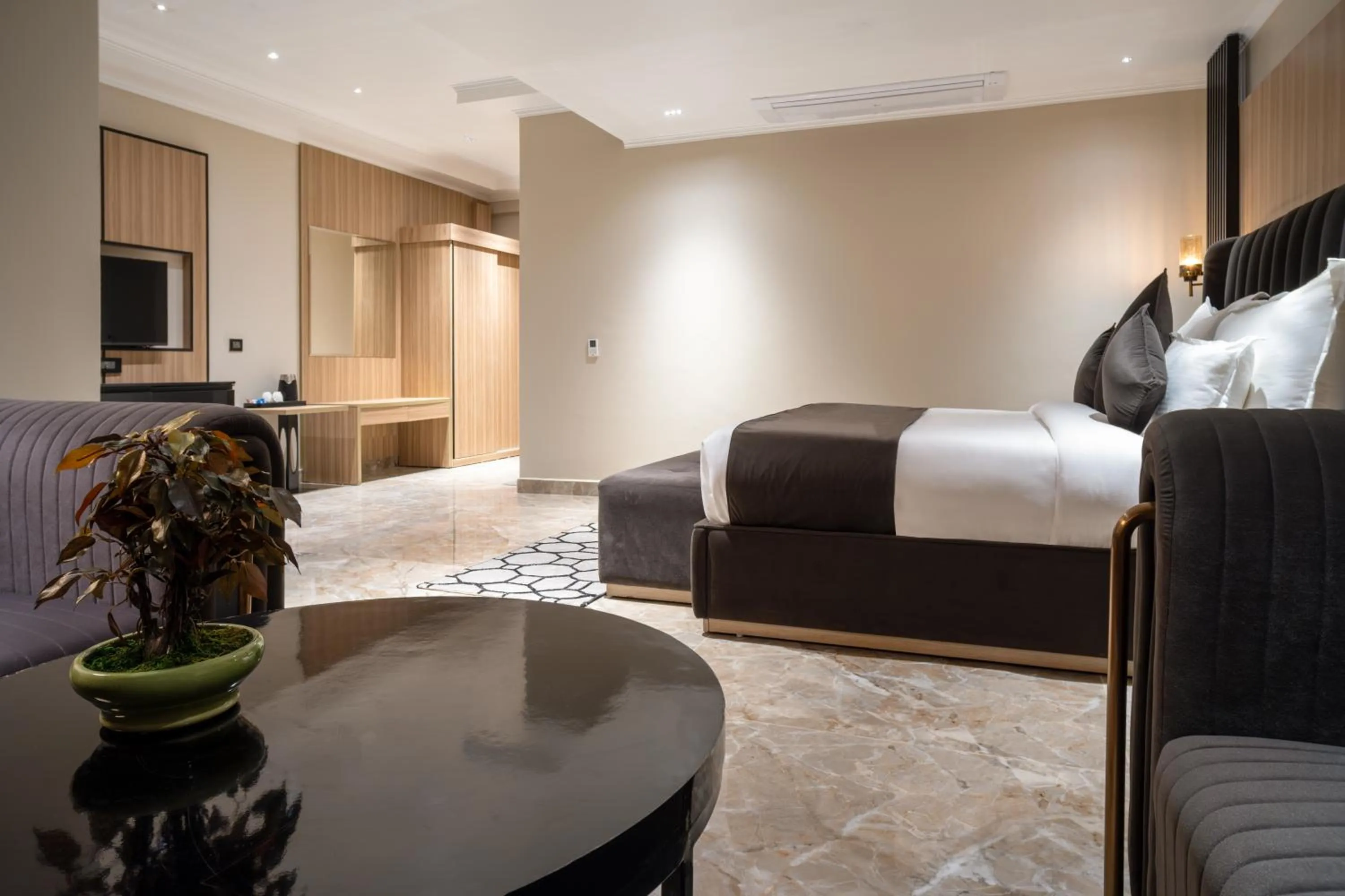 Living room, Bed in Alpine hotel and villas