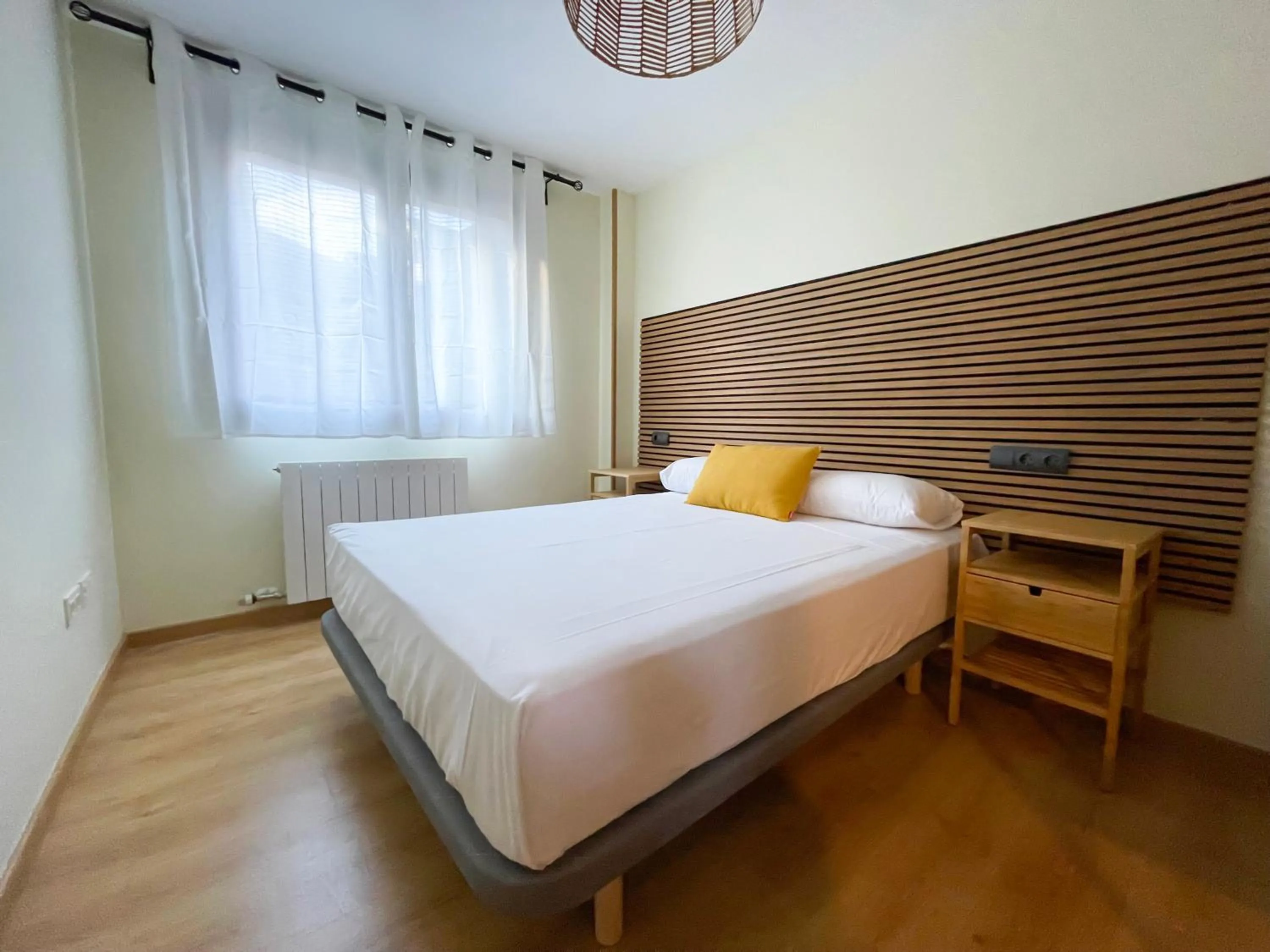 Bed in Apartamentos Escarrilla Suites 3000