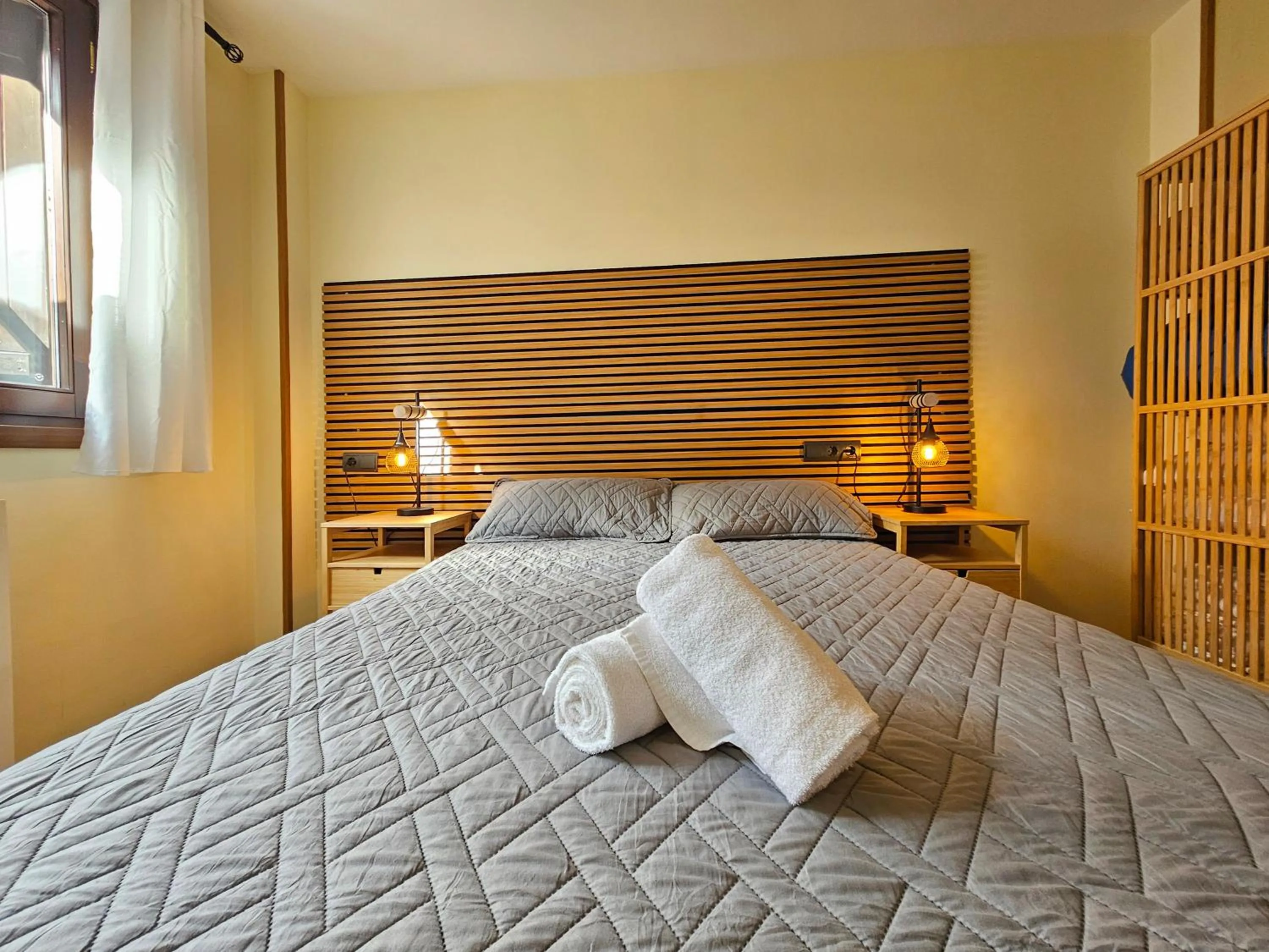 Bed in Apartamentos Escarrilla Suites 3000