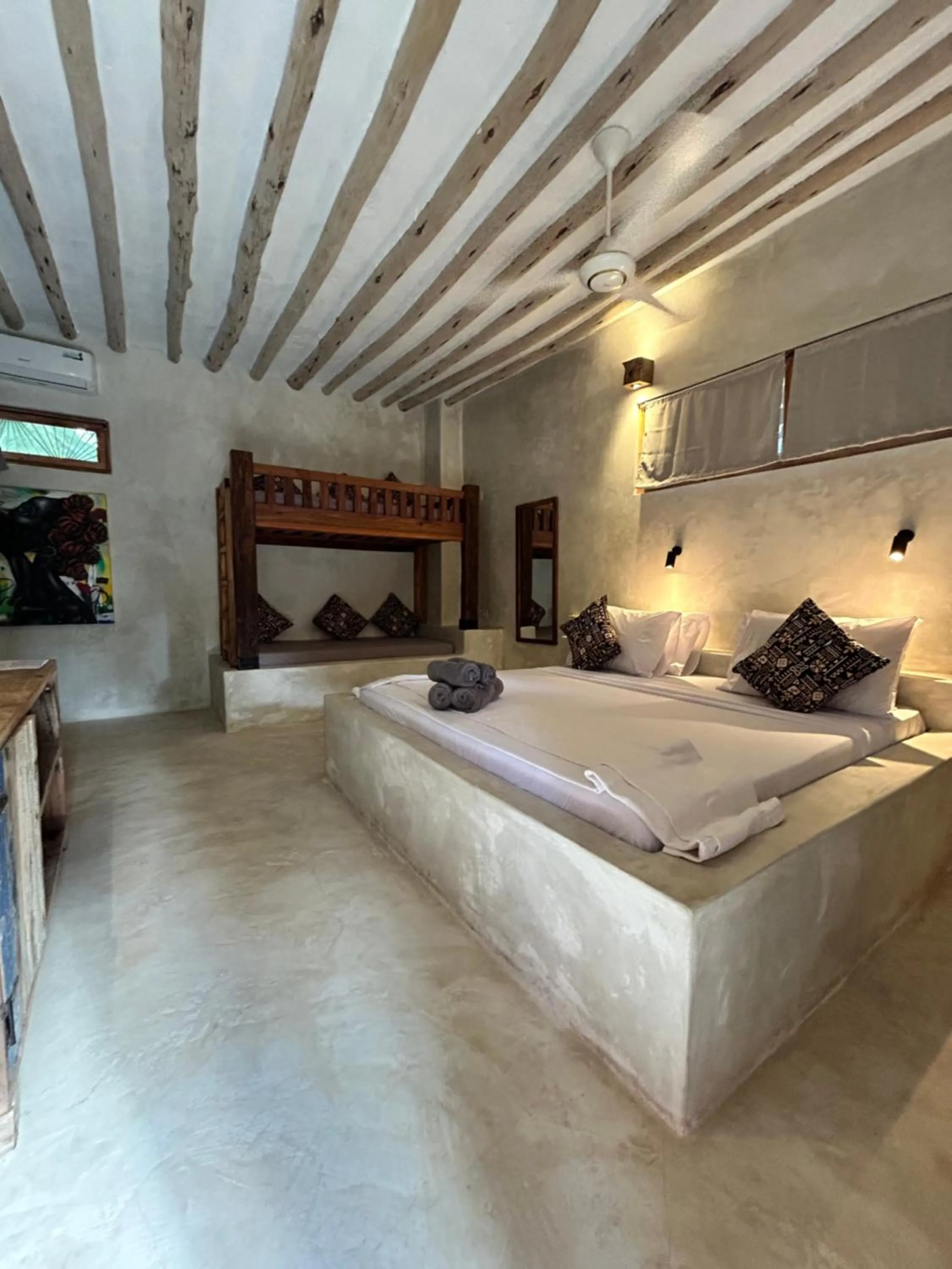 Bed in Bahari Beach Bungalows