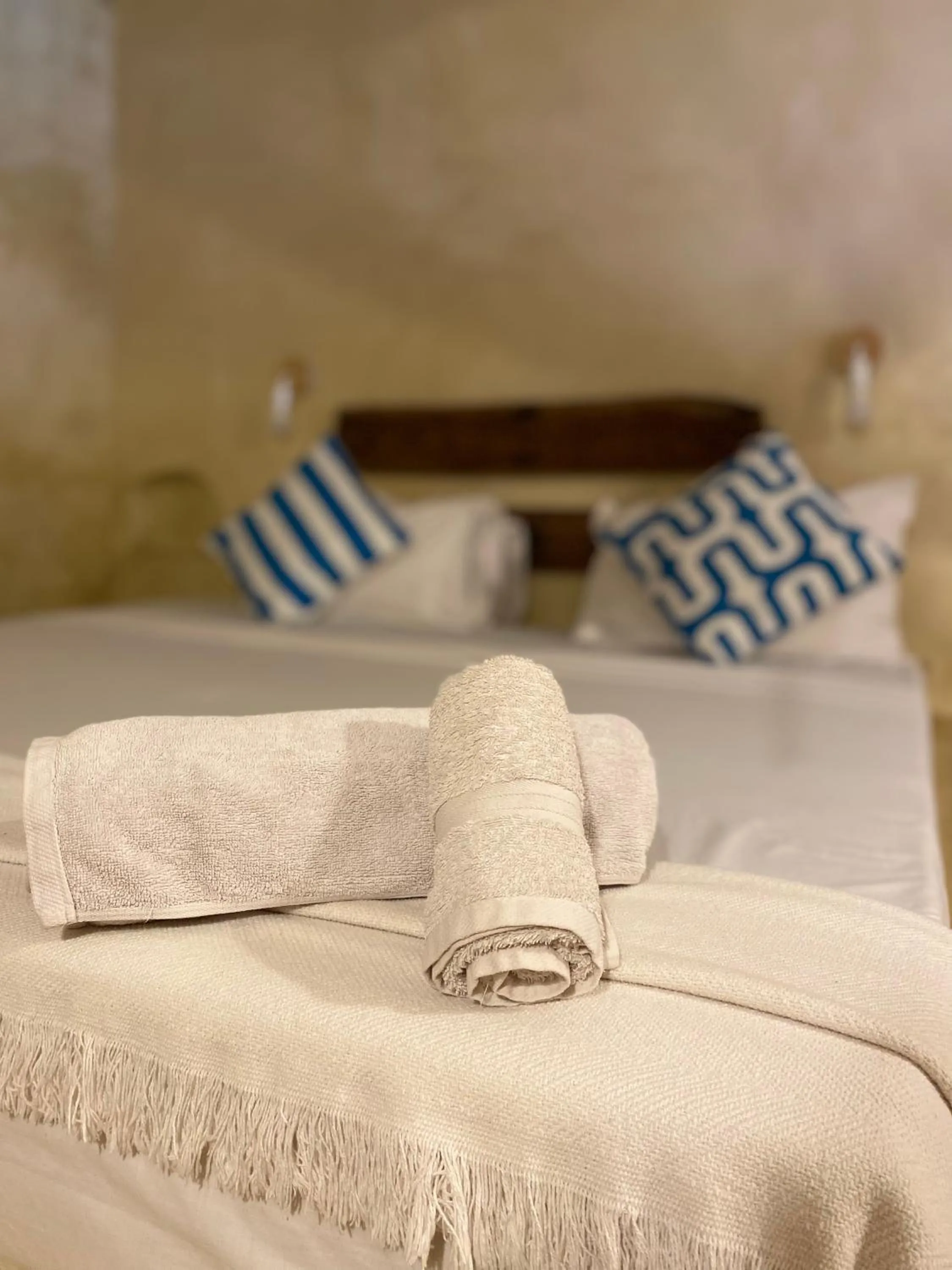 Bed in Bahari Beach Bungalows