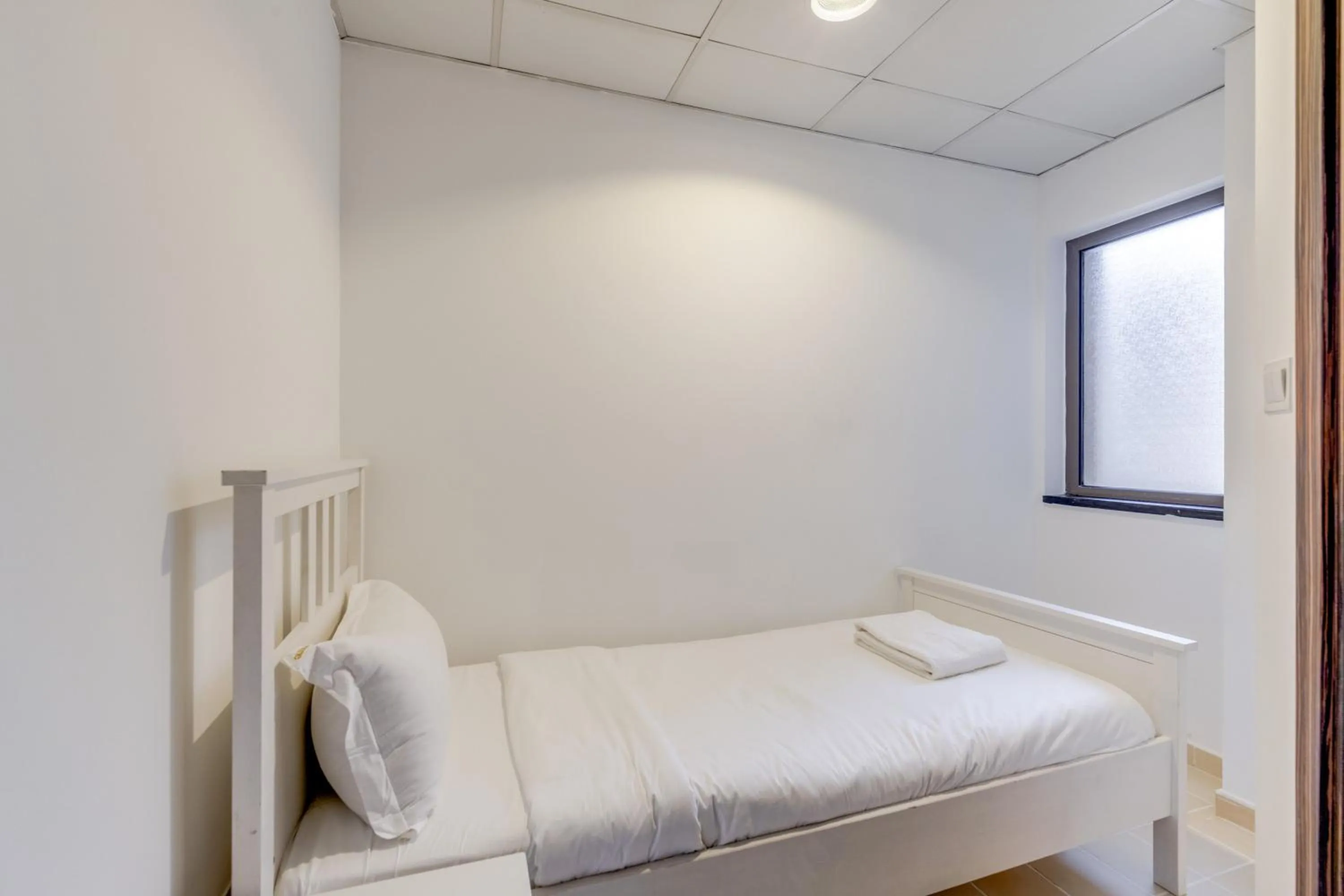 Bed in GLOBALSTAY. Modern Apartments steps to JBR Beach