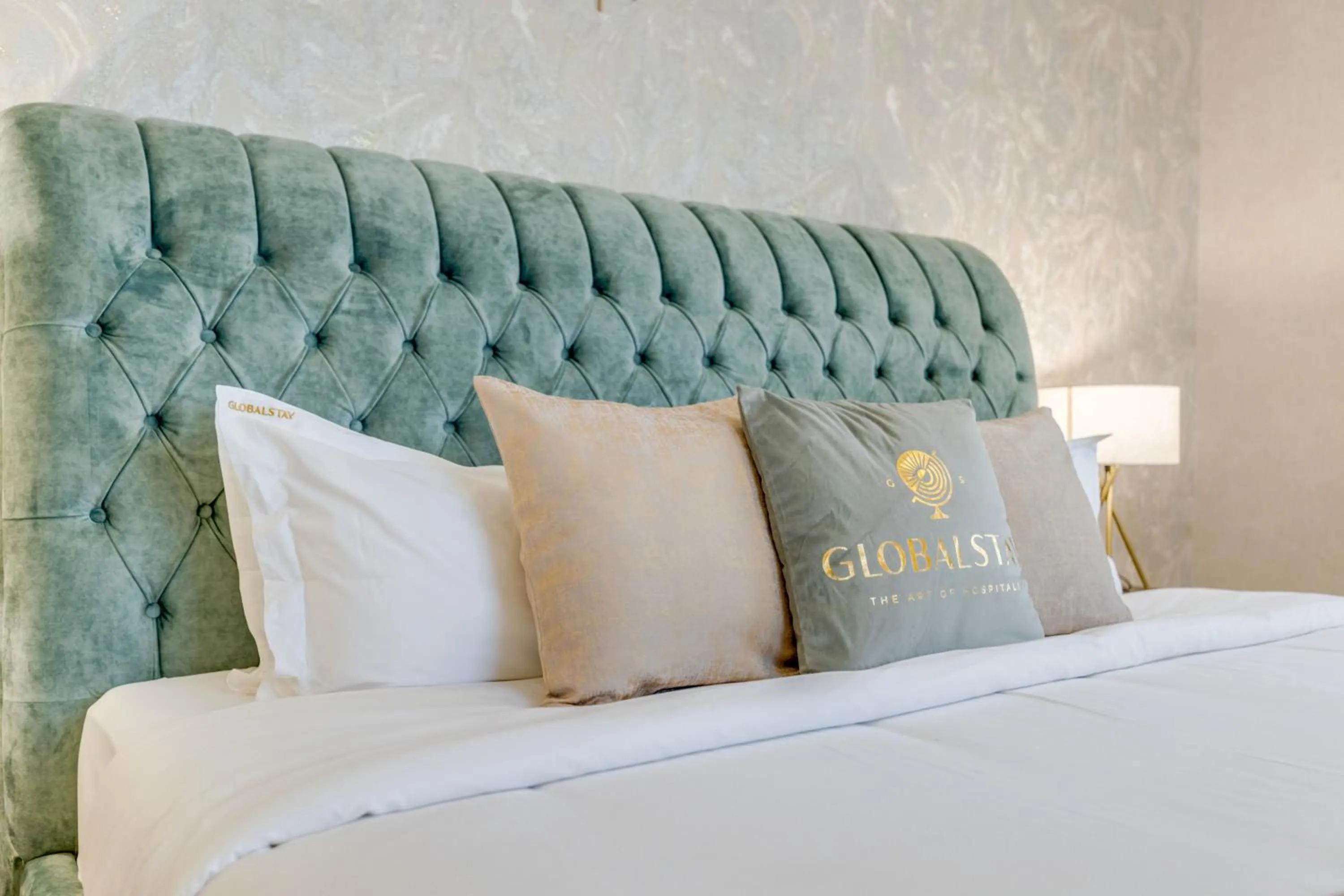 Bed in GLOBALSTAY. Modern Apartments steps to JBR Beach