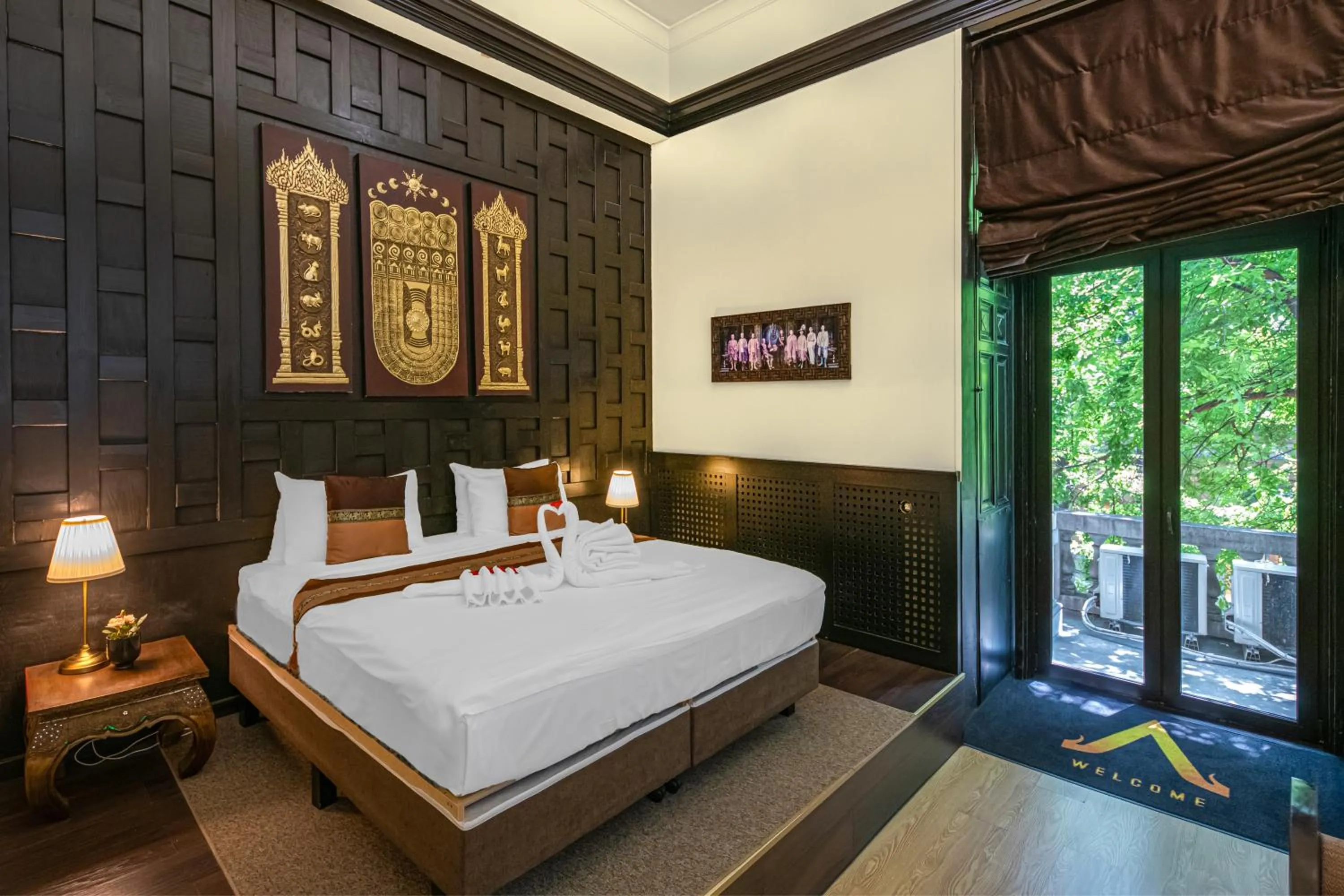 Bed in Andrassy Thai Hotel