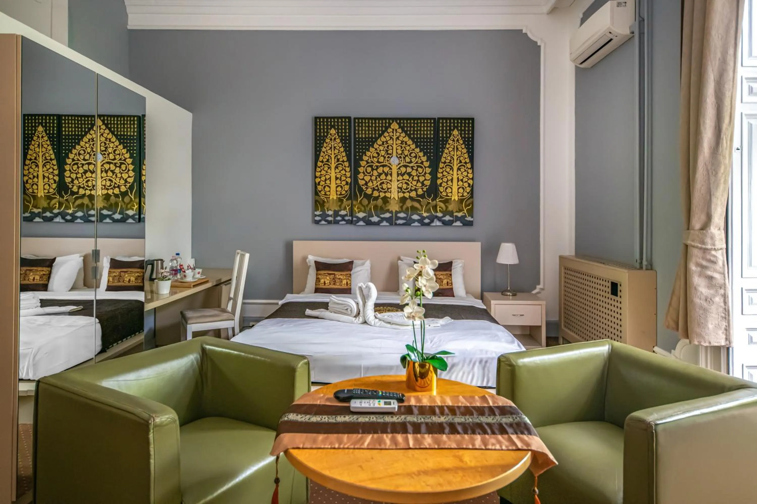 Bed in Andrassy Thai Hotel