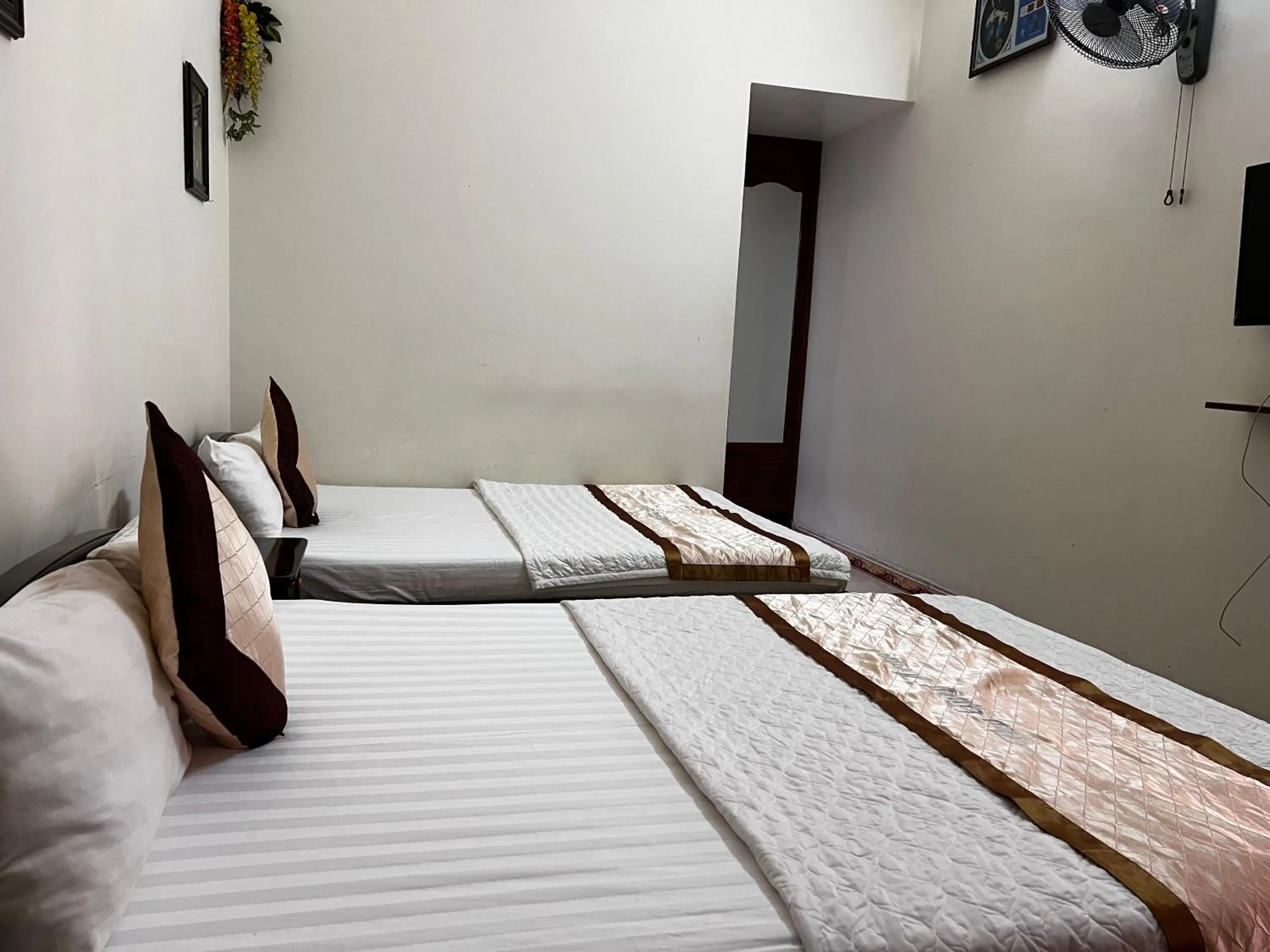 Bed in Thu Guest House