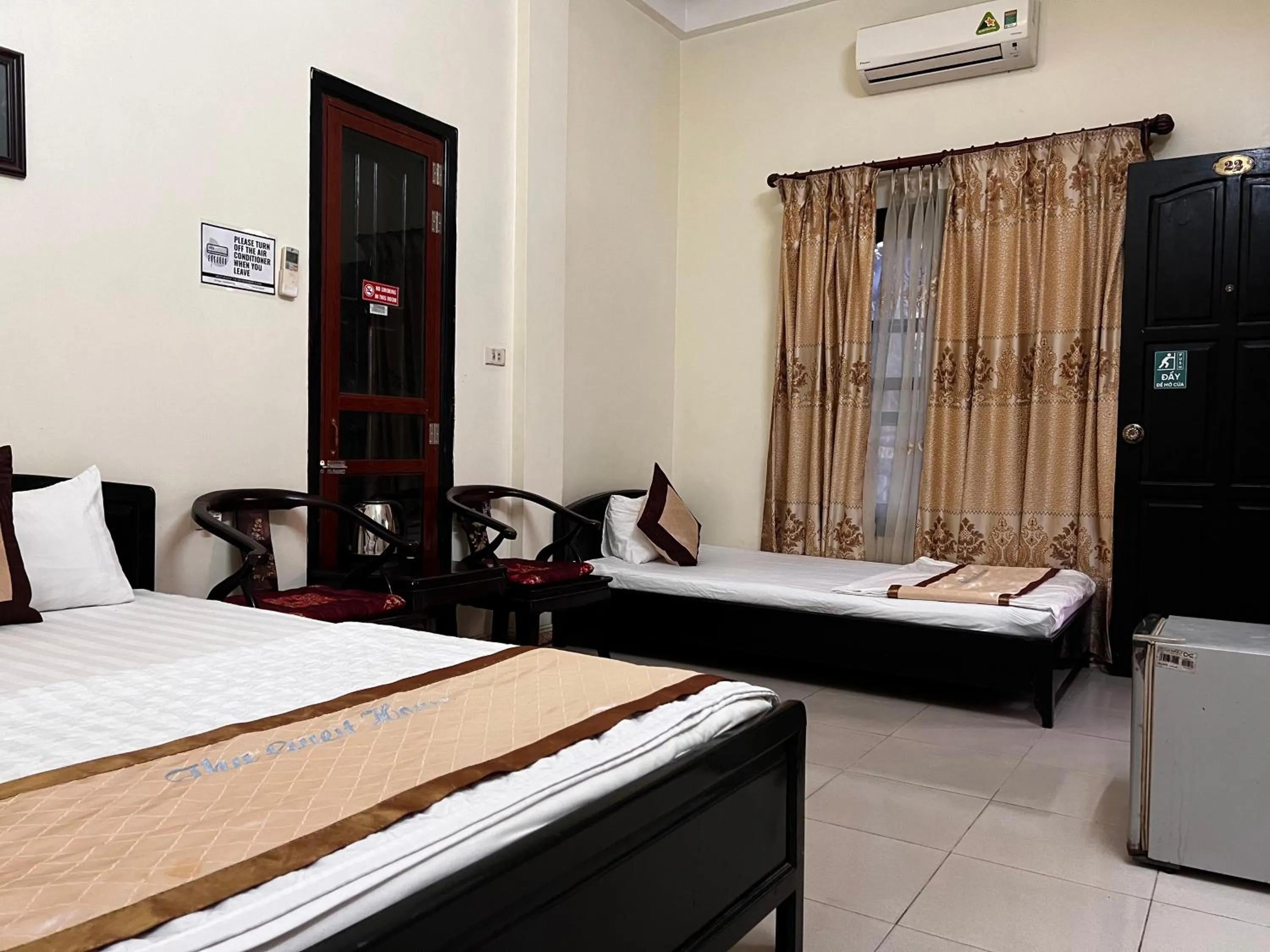 Bed in Thu Guest House