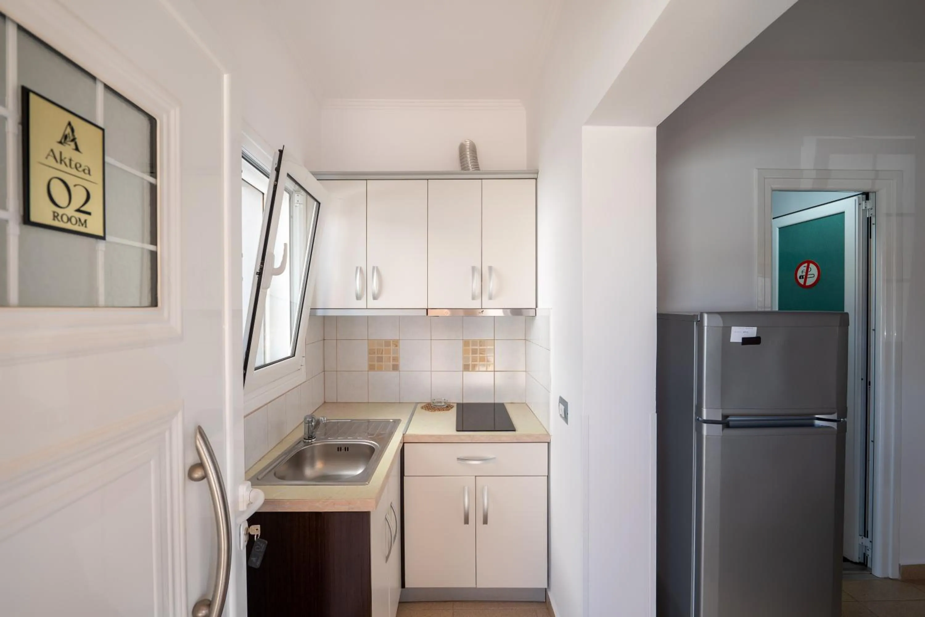 Kitchen or kitchenette in Apartments Aktea