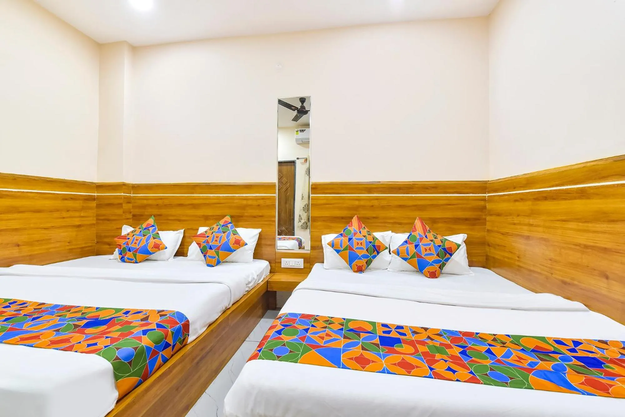 Bed in FabHotel Somnath