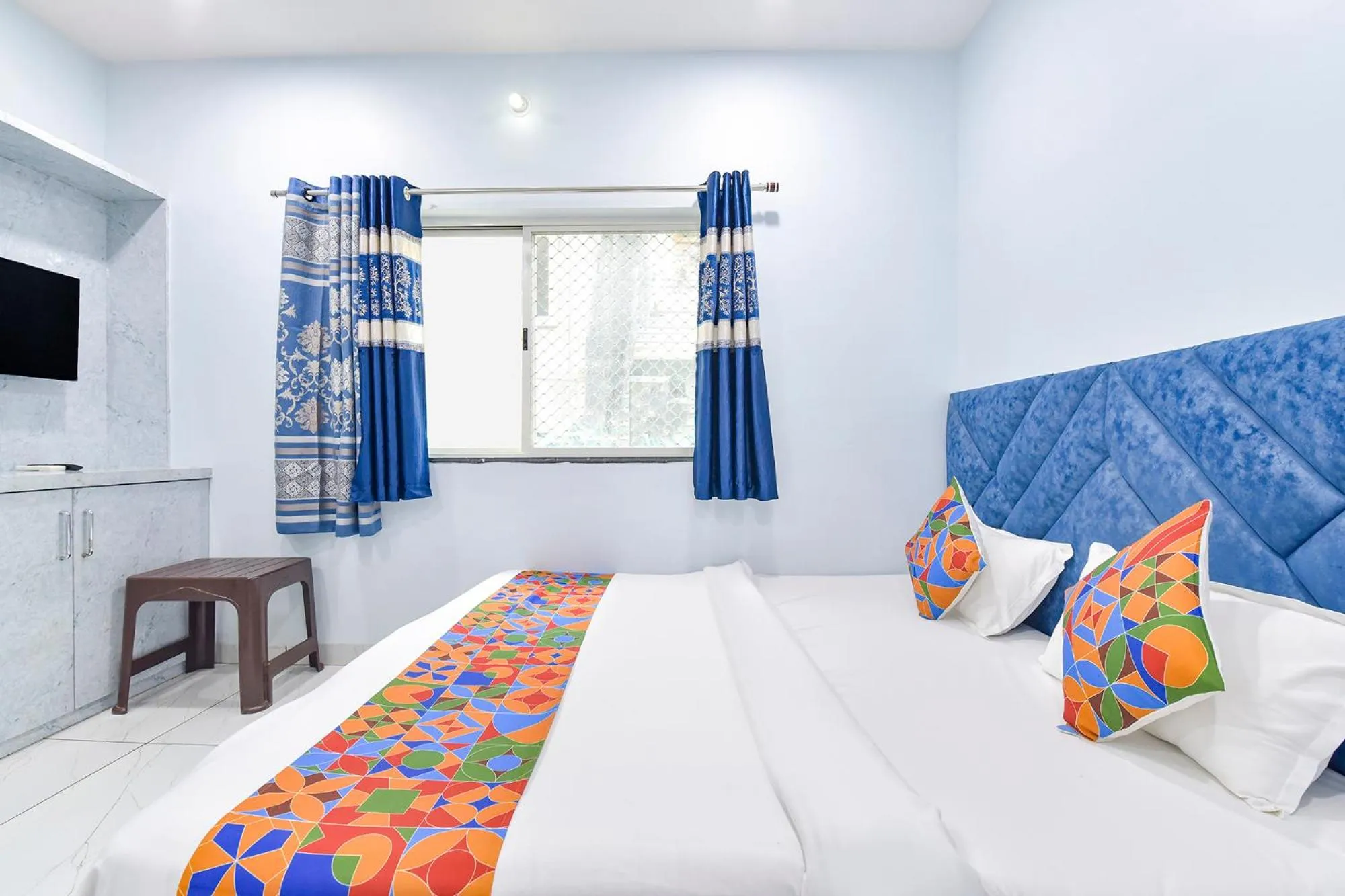 Bed in FabHotel Somnath