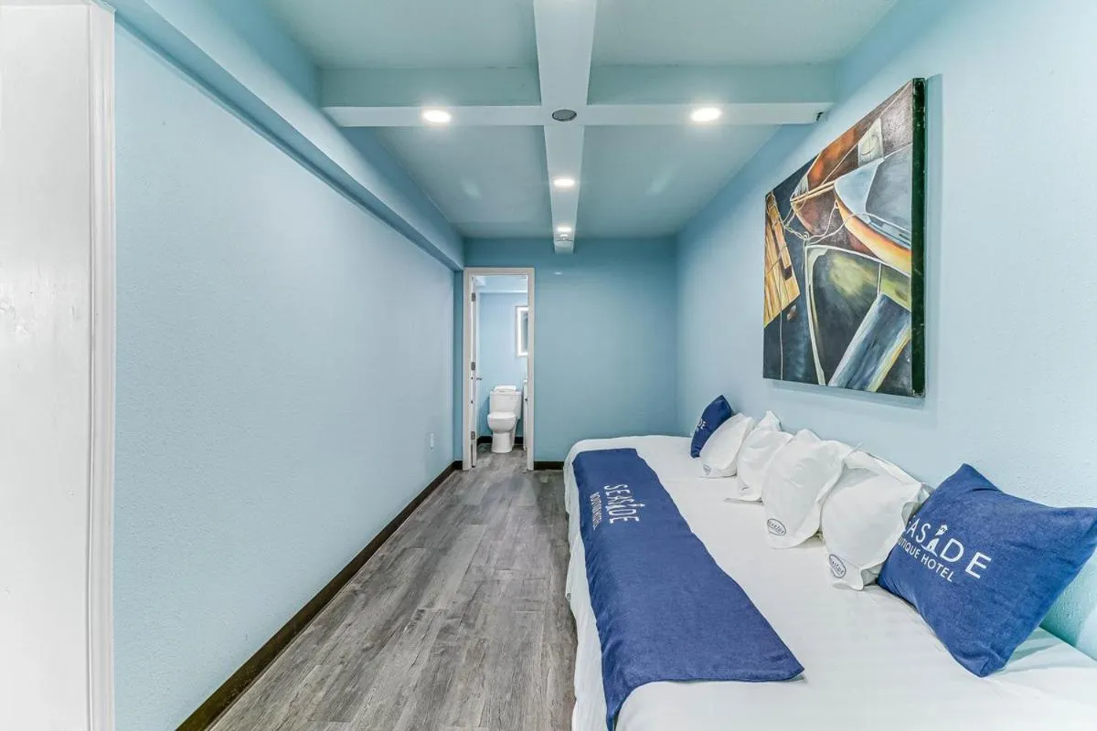 Bed in Seaside Boutique Hotel, Waves At Your Doorstep