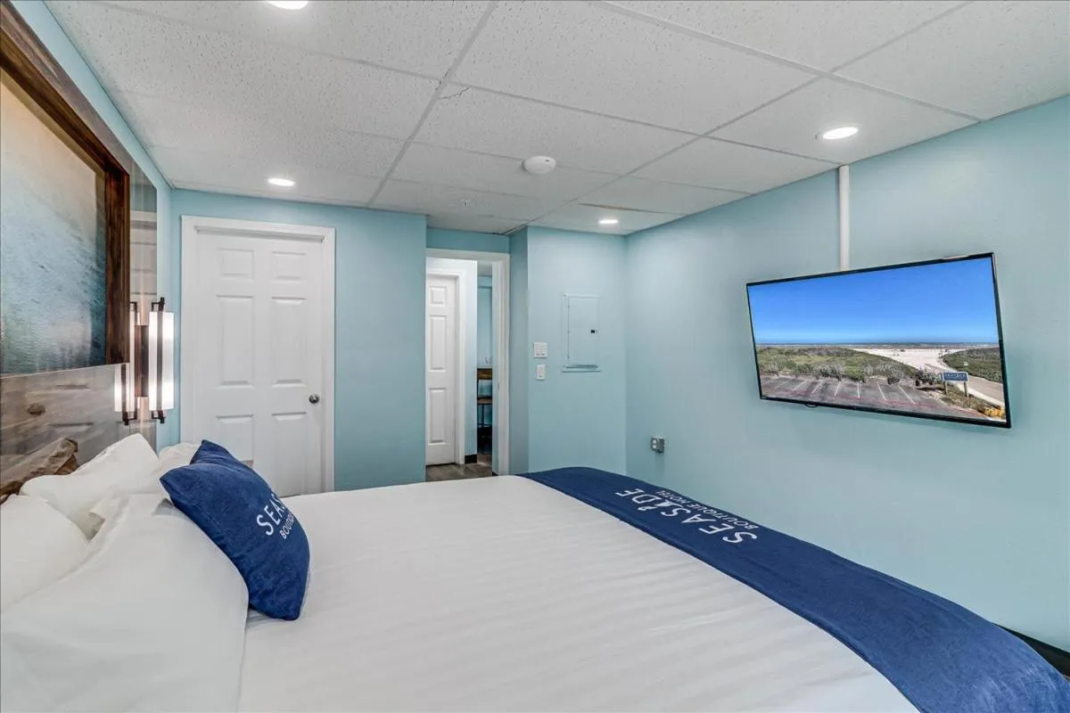 Bed in Seaside Boutique Hotel, Waves At Your Doorstep