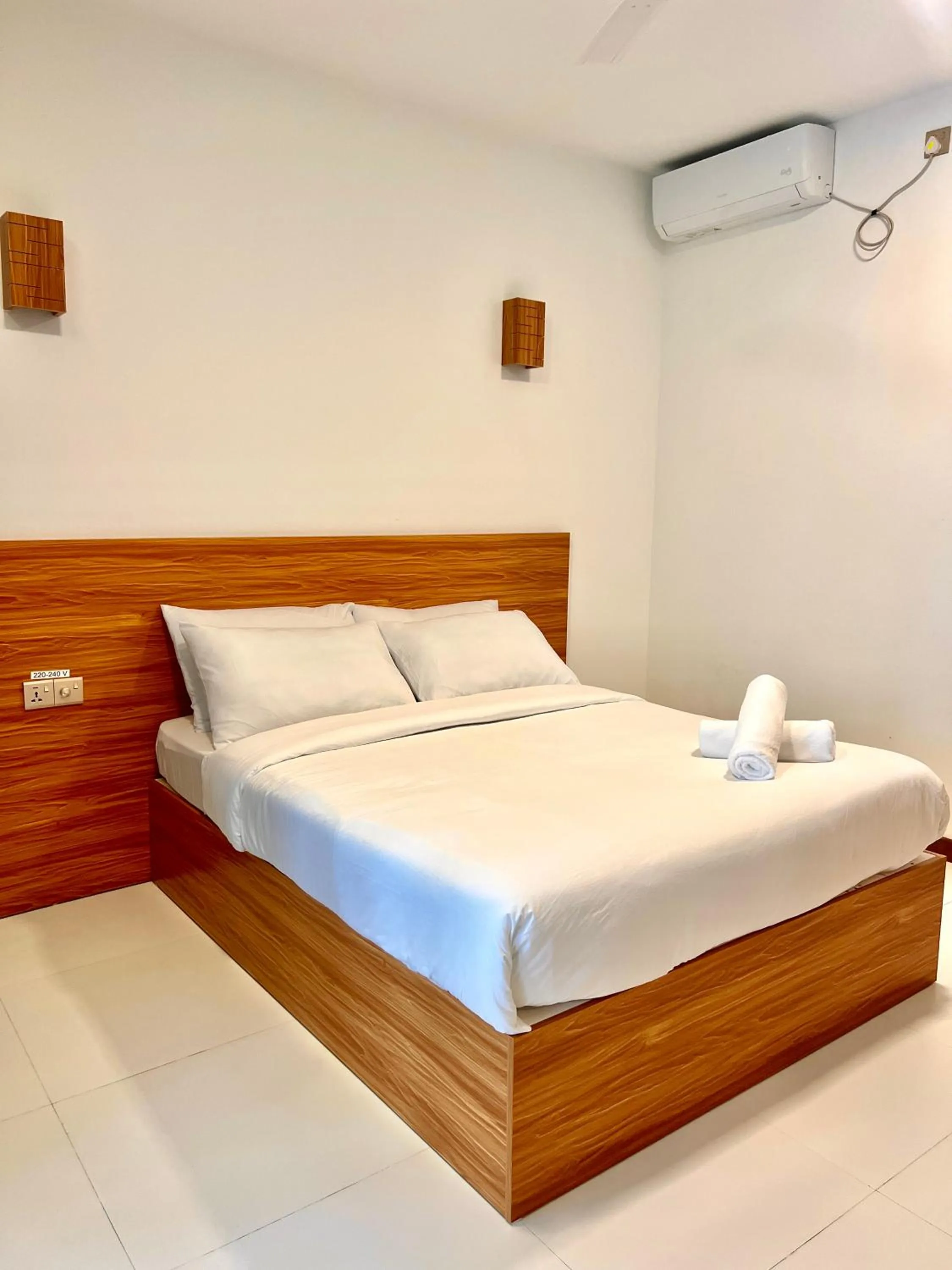 Bed in Vilu Residence