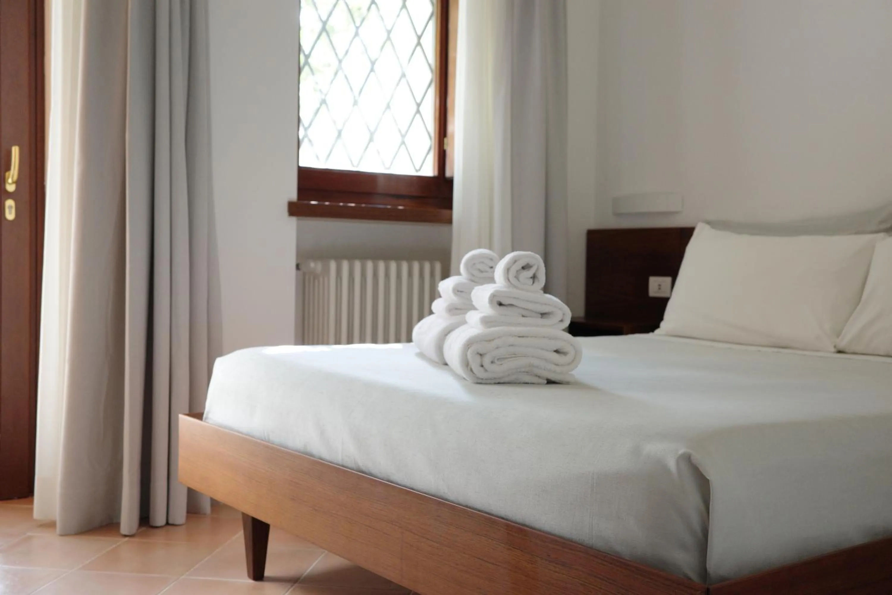 Bedroom in L'Ulivo Bed and Breakfast