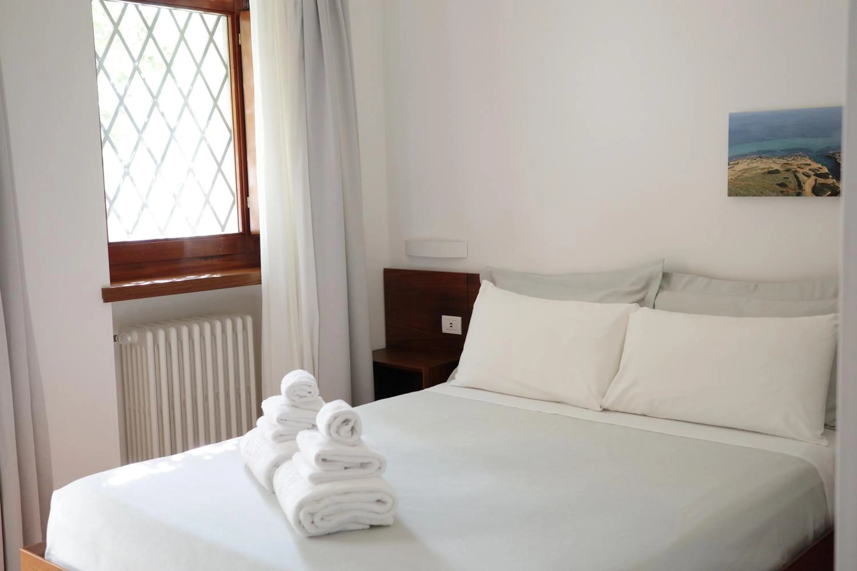 Bedroom in L'Ulivo Bed and Breakfast