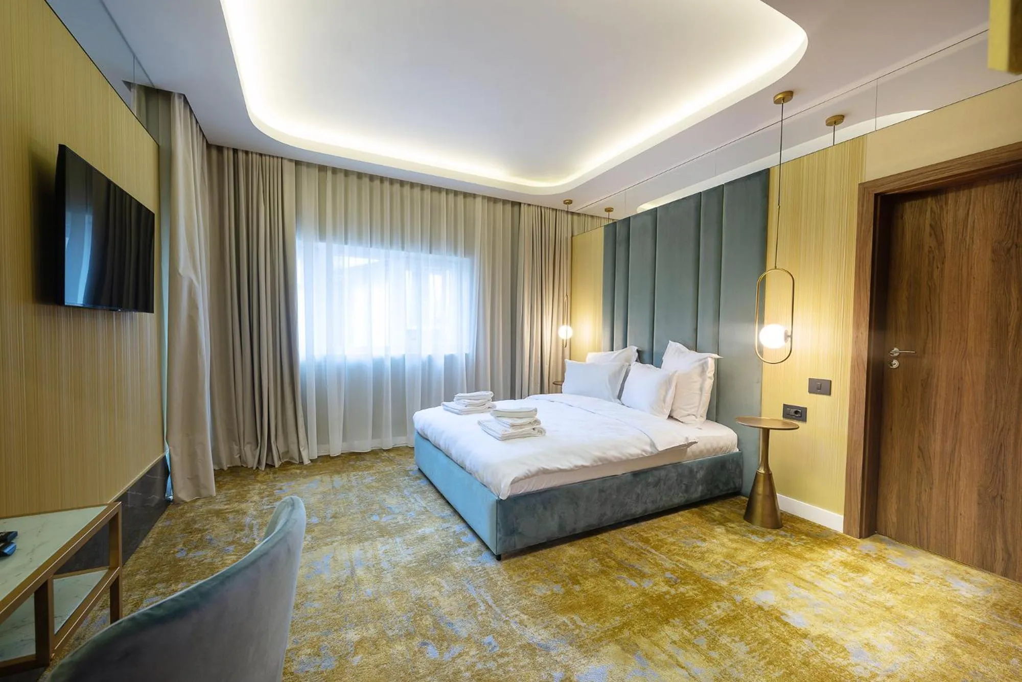 Bed in Yasu Luxury Rooms