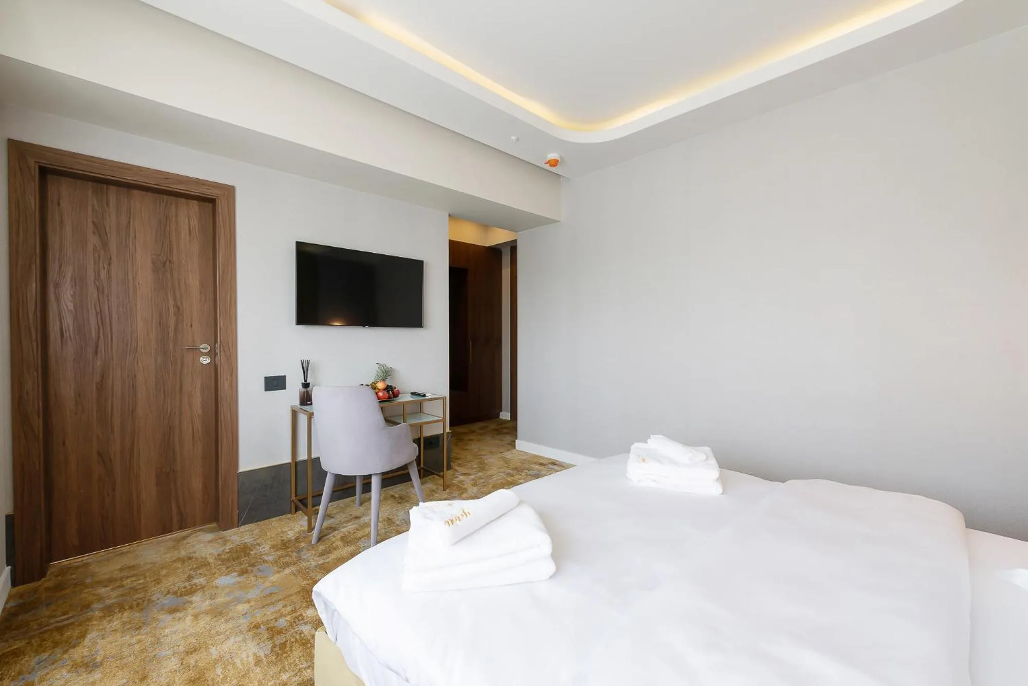 Bed in Yasu Luxury Rooms