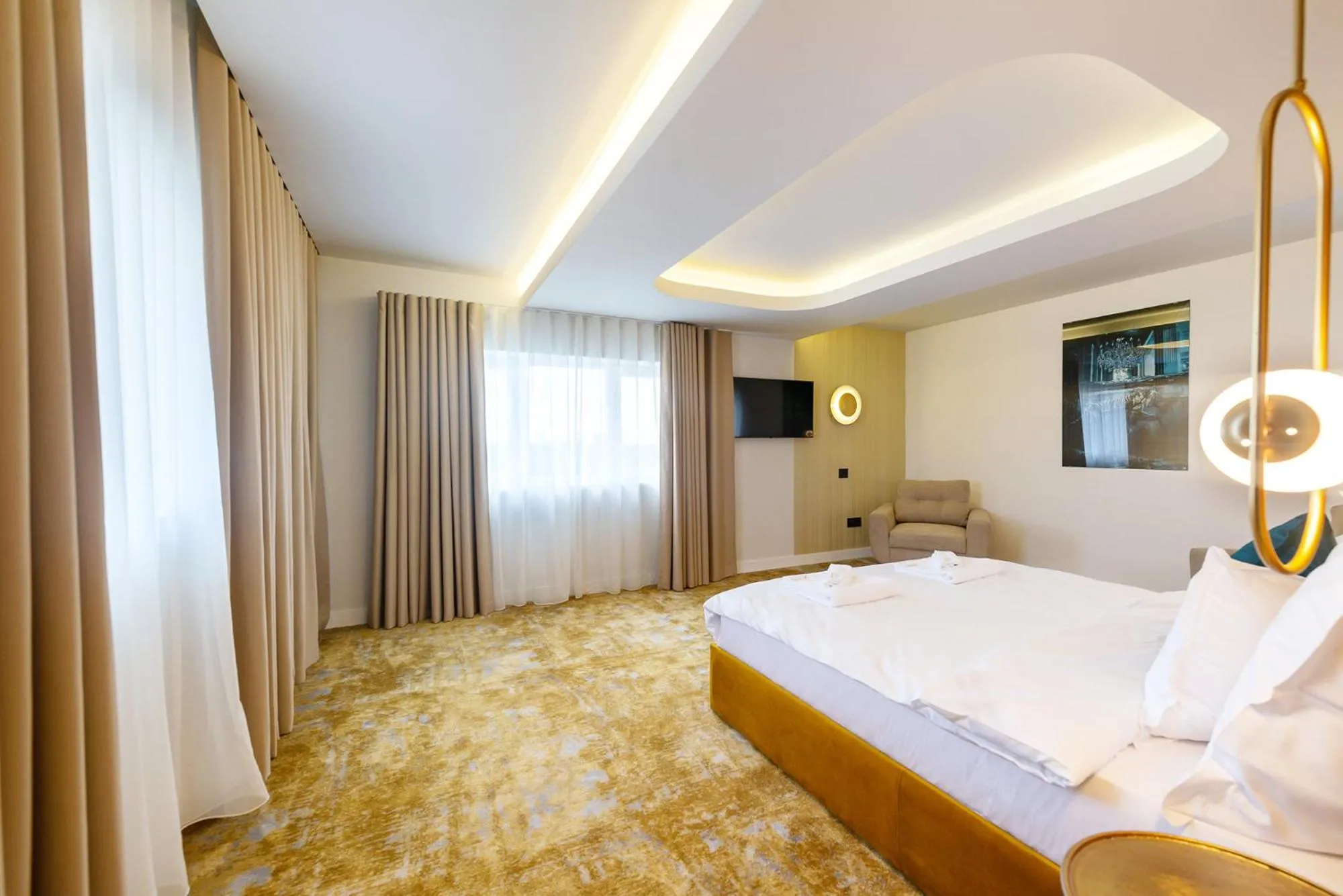 Bed in Yasu Luxury Rooms