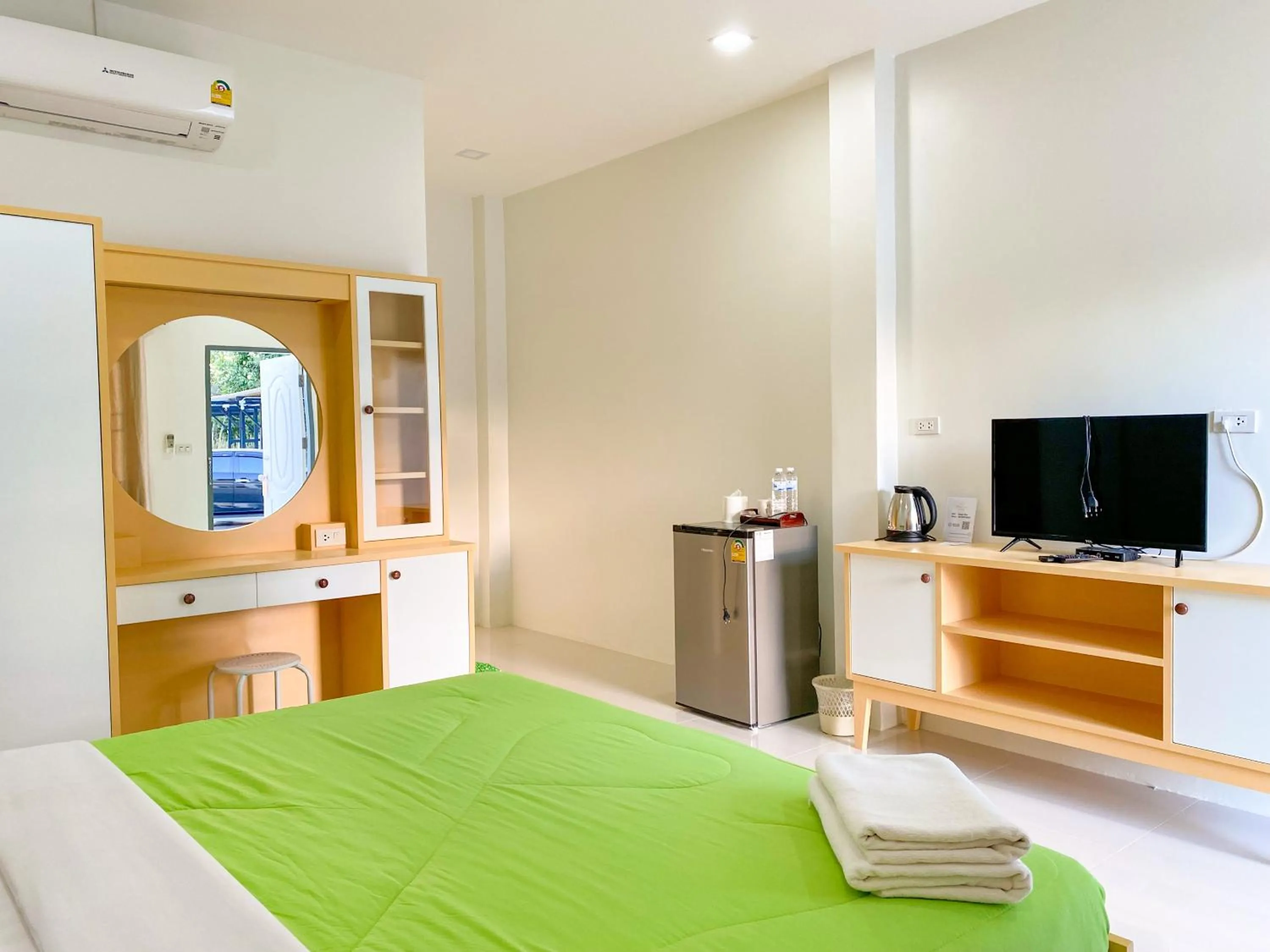TV and multimedia, Bed in บ้านพักสิริ มุกดาหาร (Baan Siri Mukdahan)
