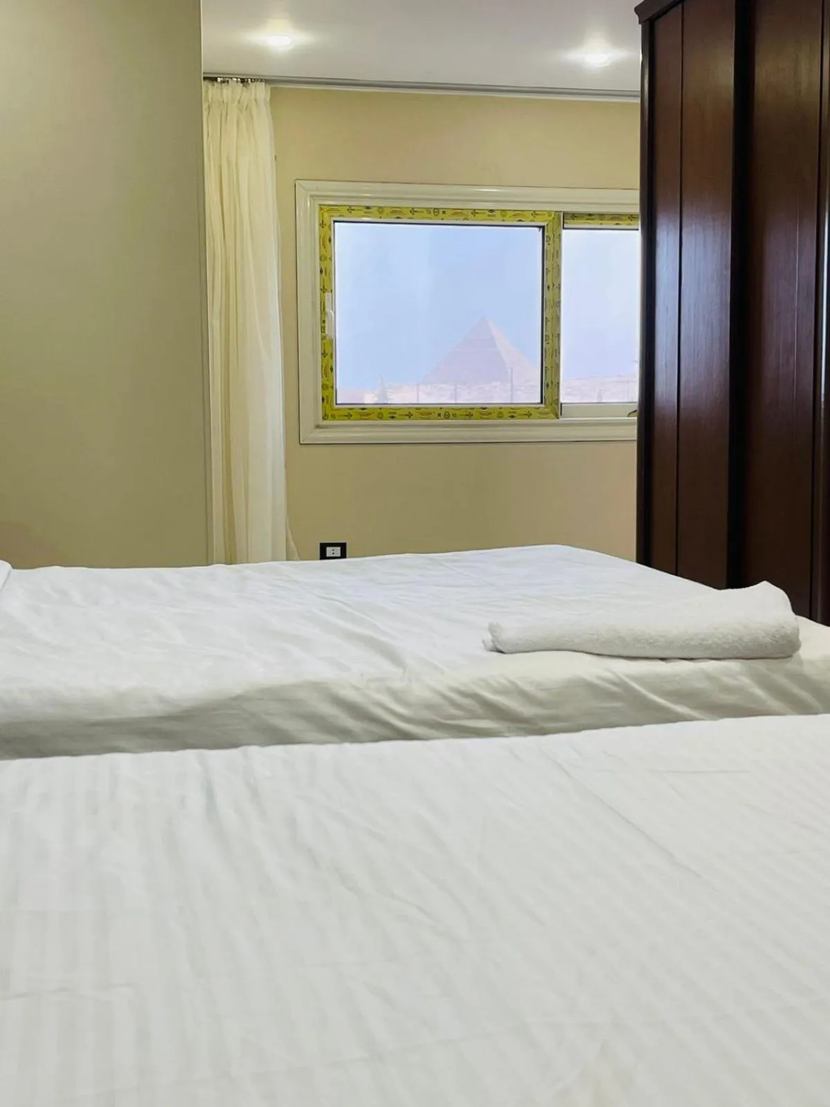 Bed in Grand Museum Pyramids View Hotel