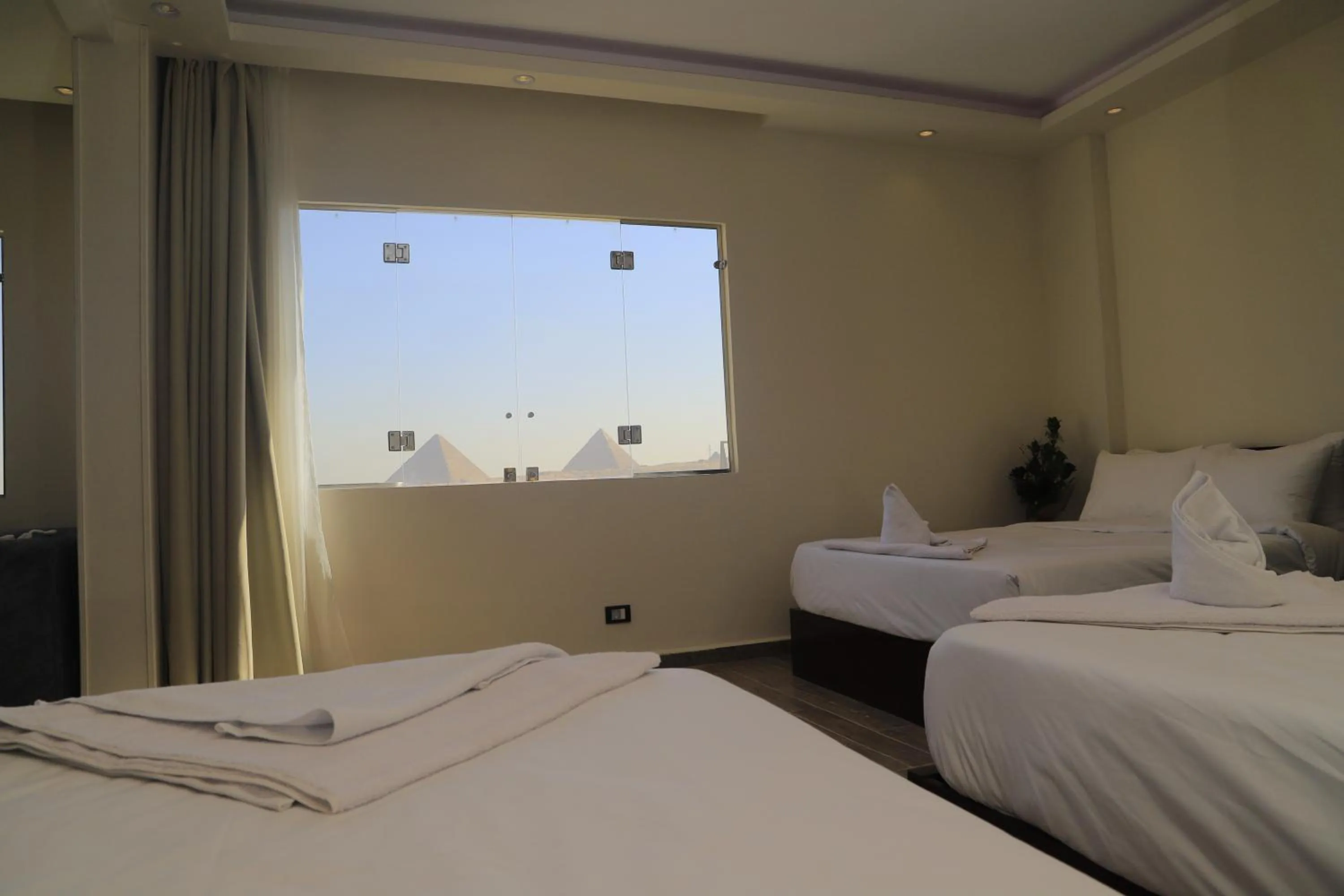 Bed in Grand Museum Pyramids View Hotel