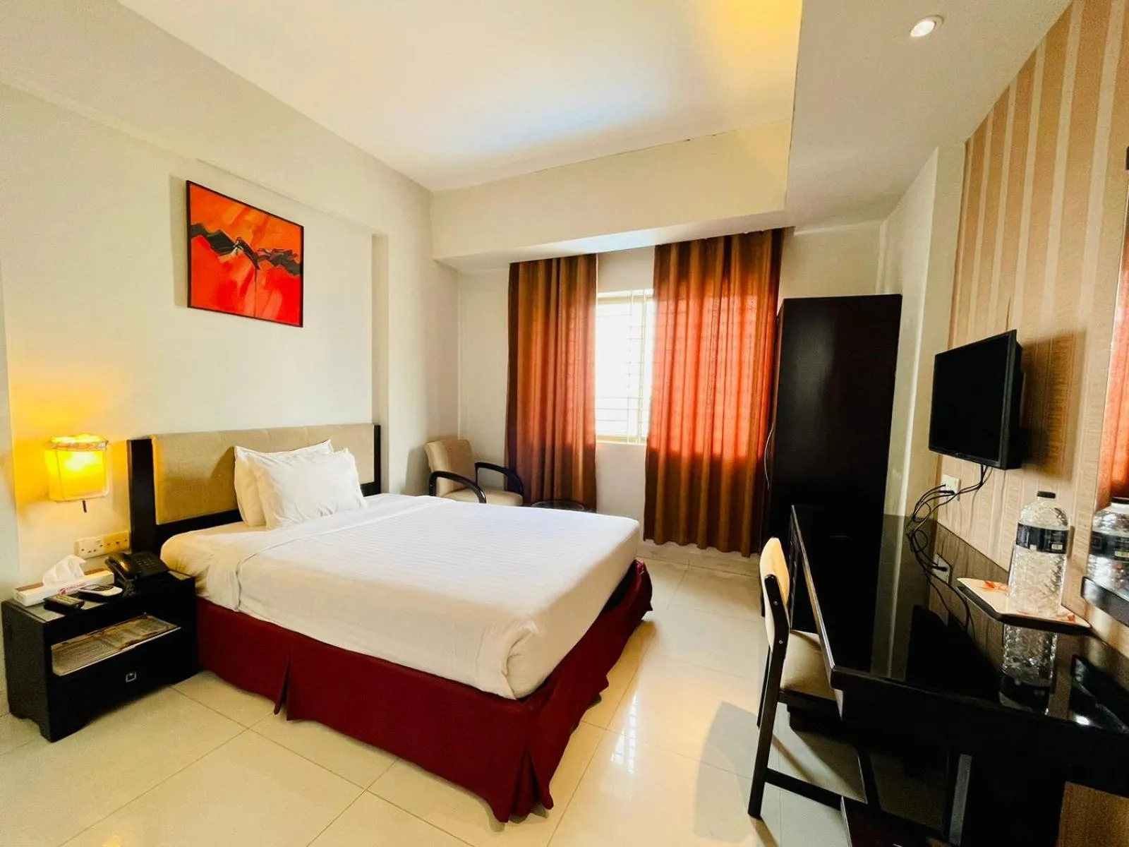 Bed in Orchid Business Hotel