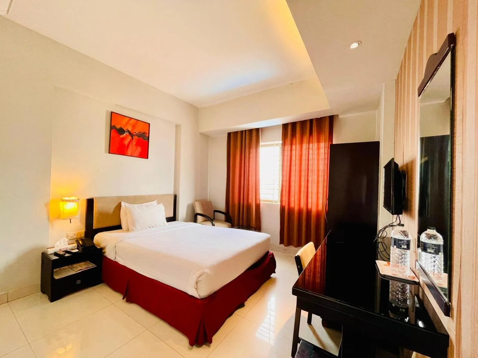 Bed in Orchid Business Hotel