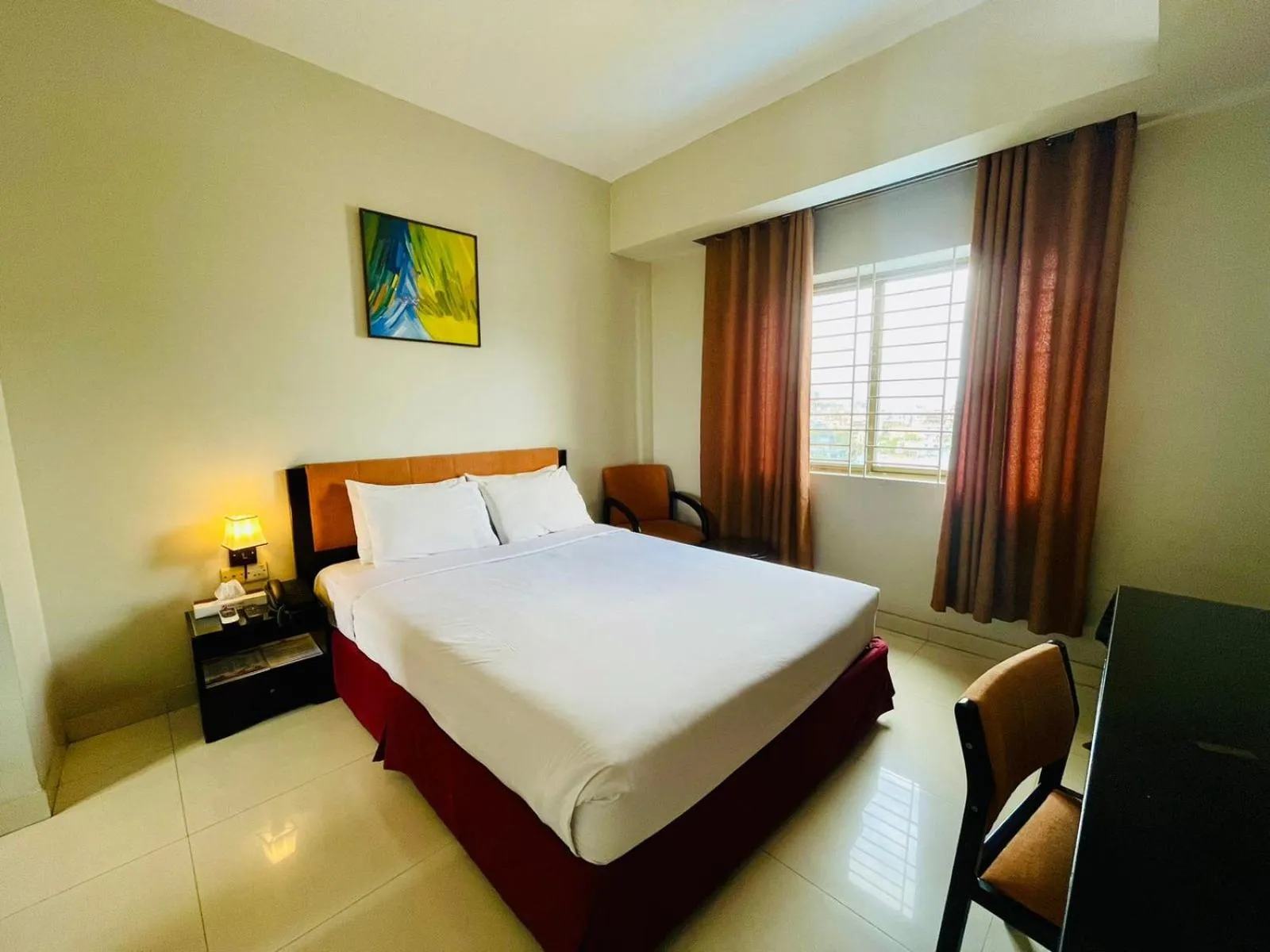 Bed in Orchid Business Hotel