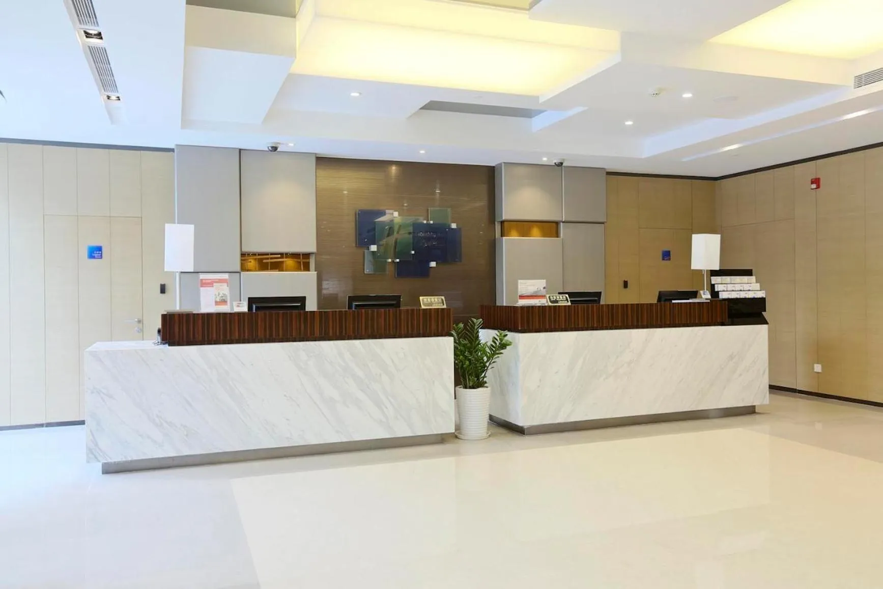 Lobby or reception in Holiday Inn Express Shanghai Gongkang by IHG