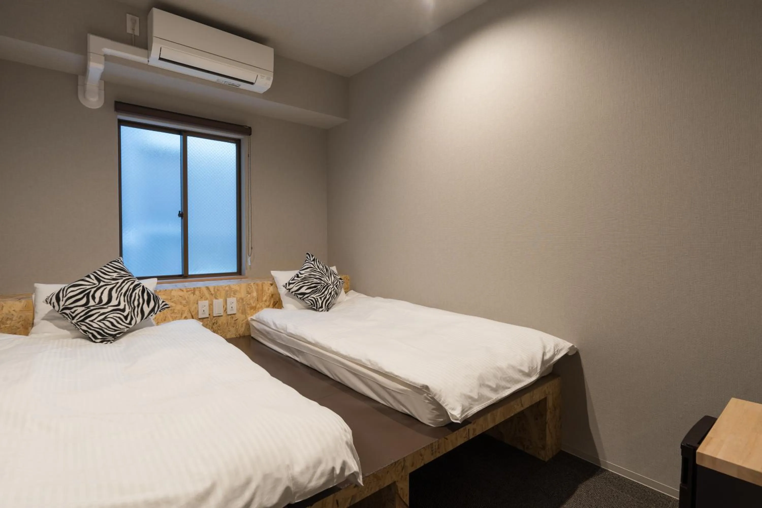 Bed in 3U NAMBA MINAMI - DOYANEN HOTELs