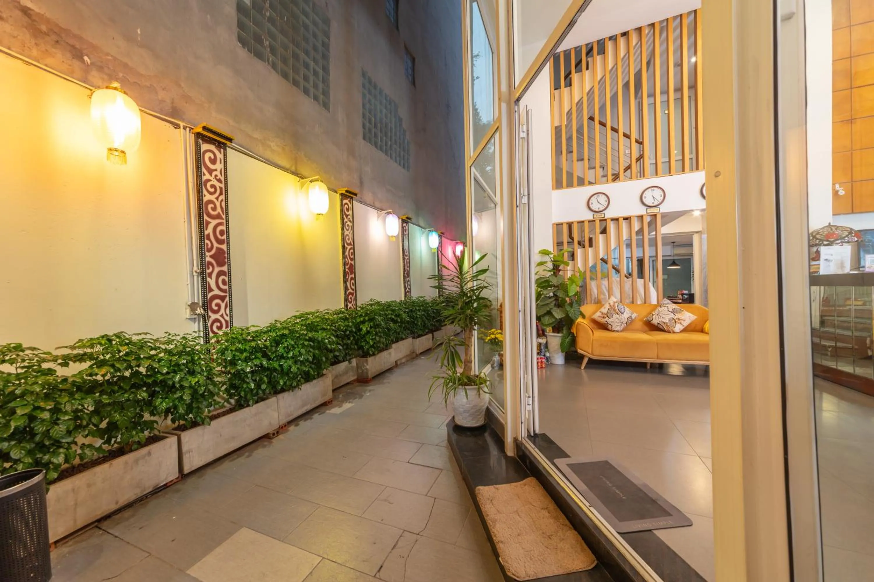 Property logo or sign in Golden Sunshine Villa Hotel and Travel