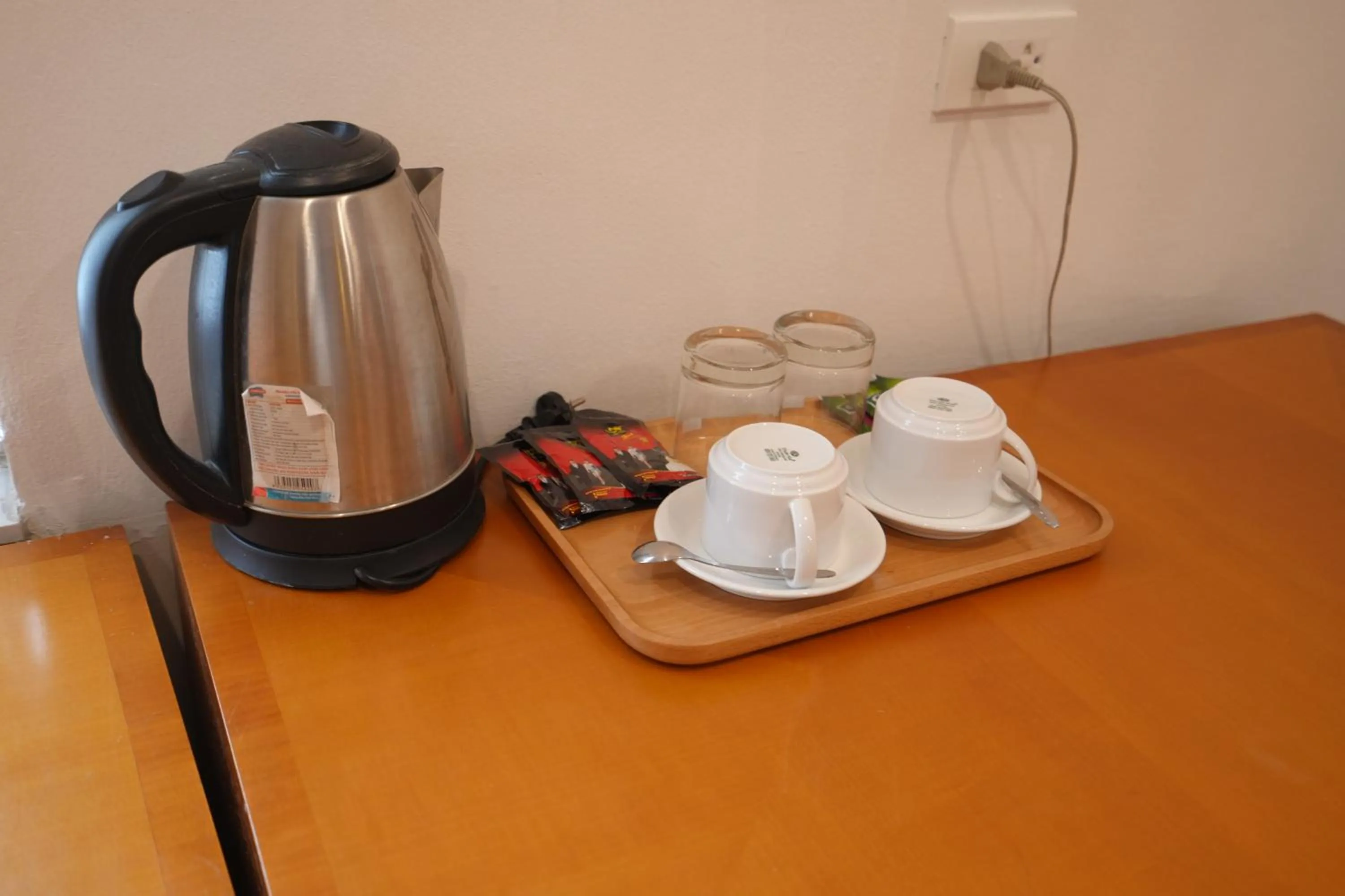 Coffee/tea facilities in Golden Sunshine Villa Hotel and Travel