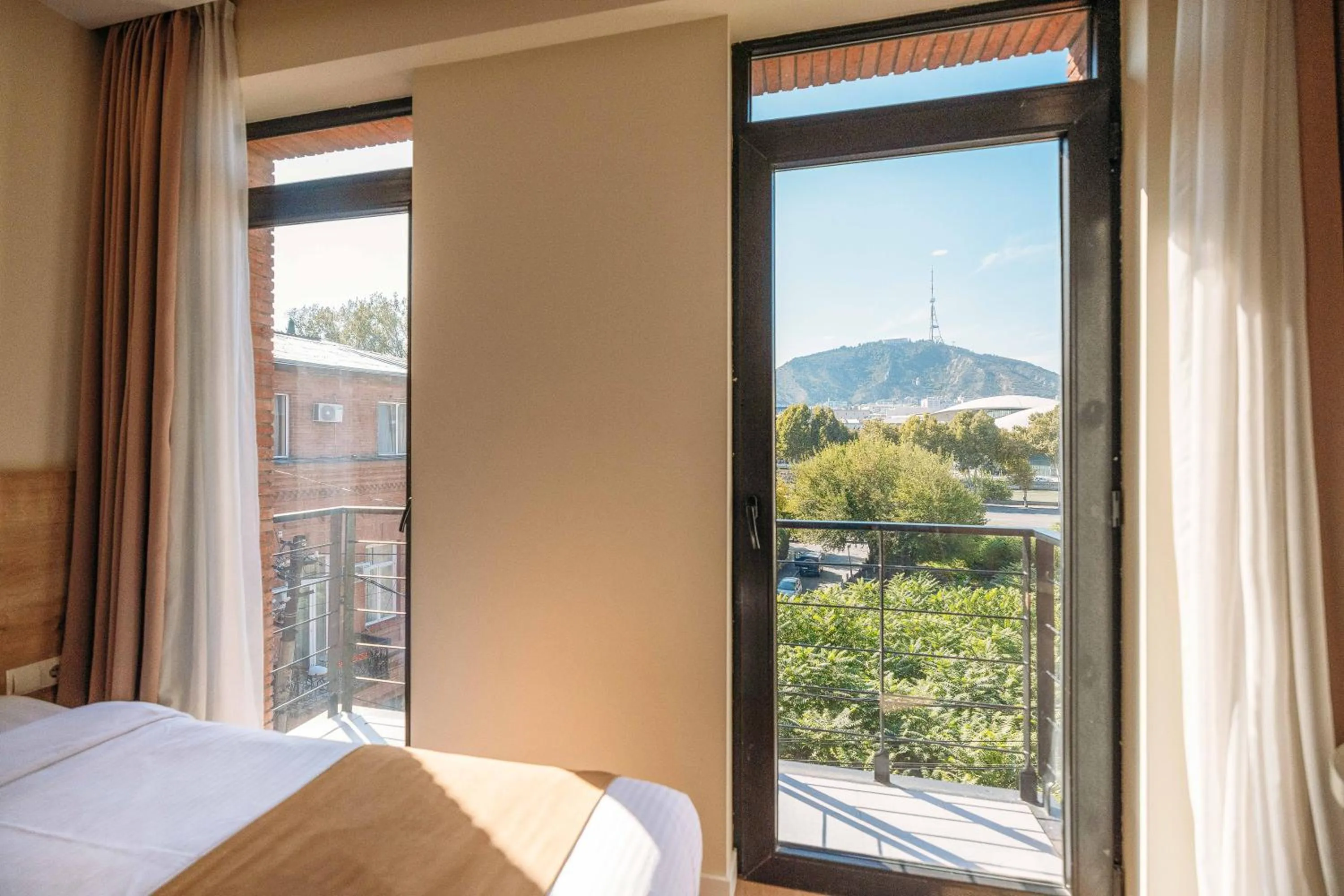 Bed in Atrium Boutique Hotel