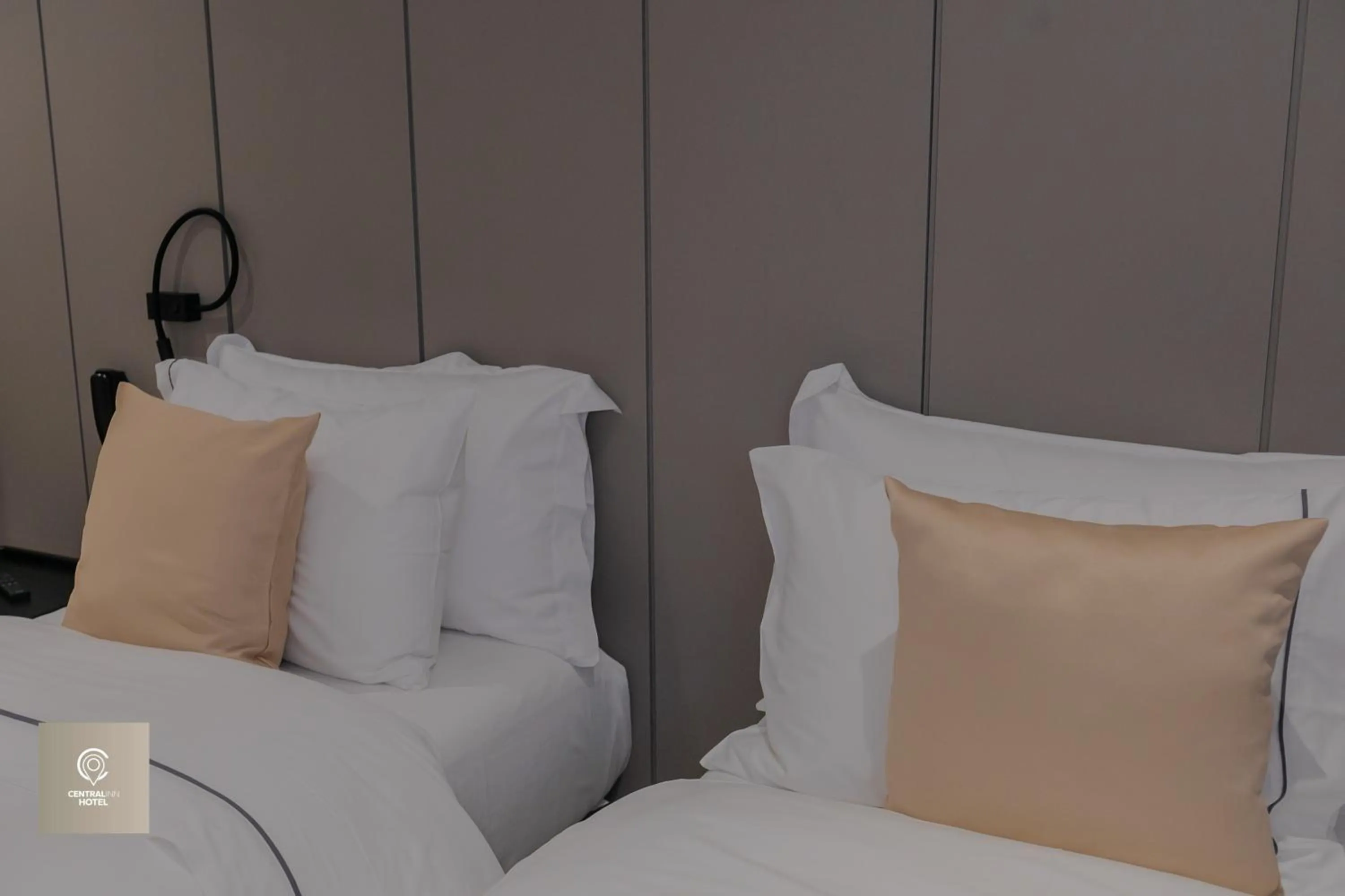 Bed in Central Inn Hotel