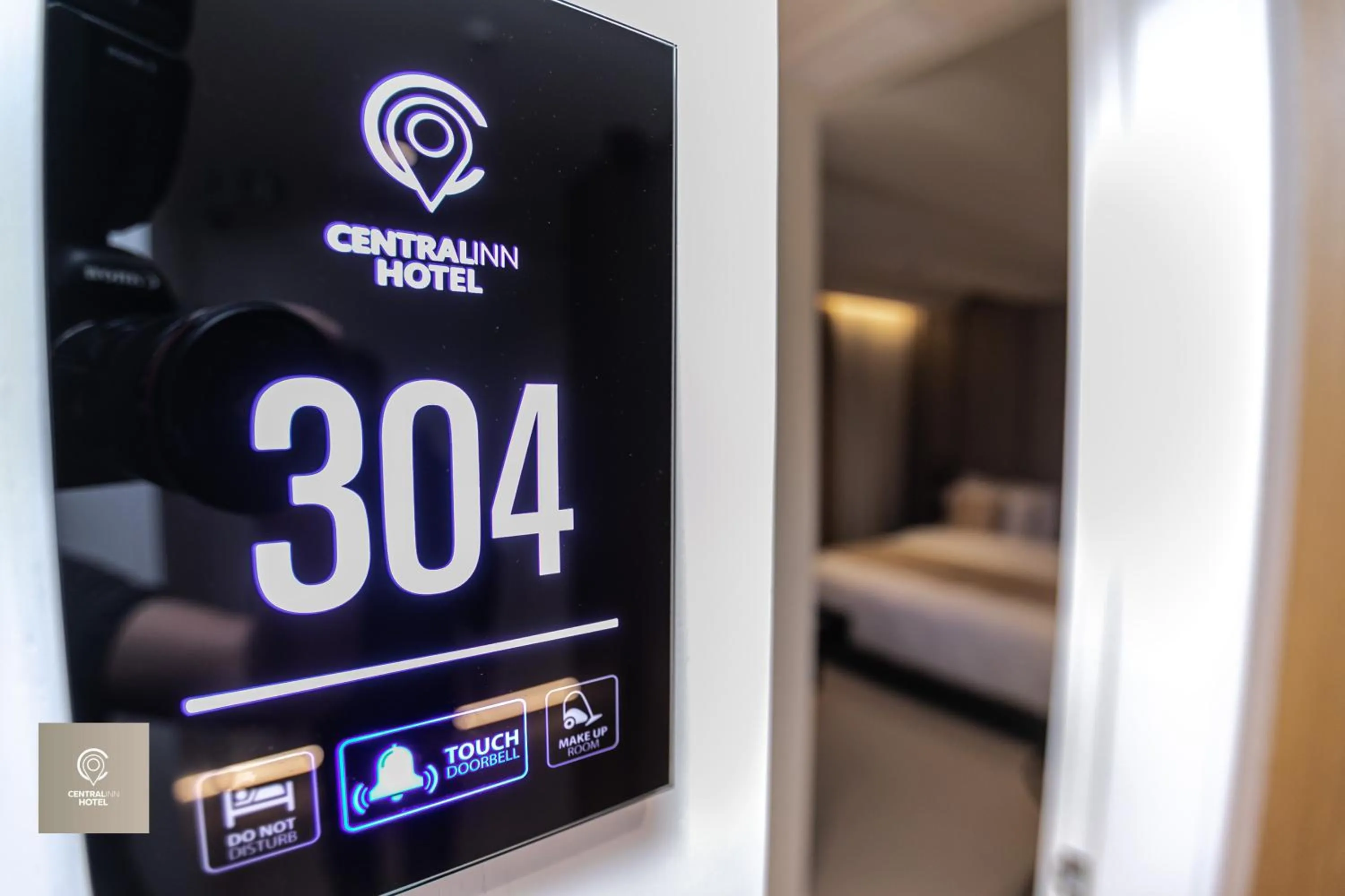 Bed in Central Inn Hotel