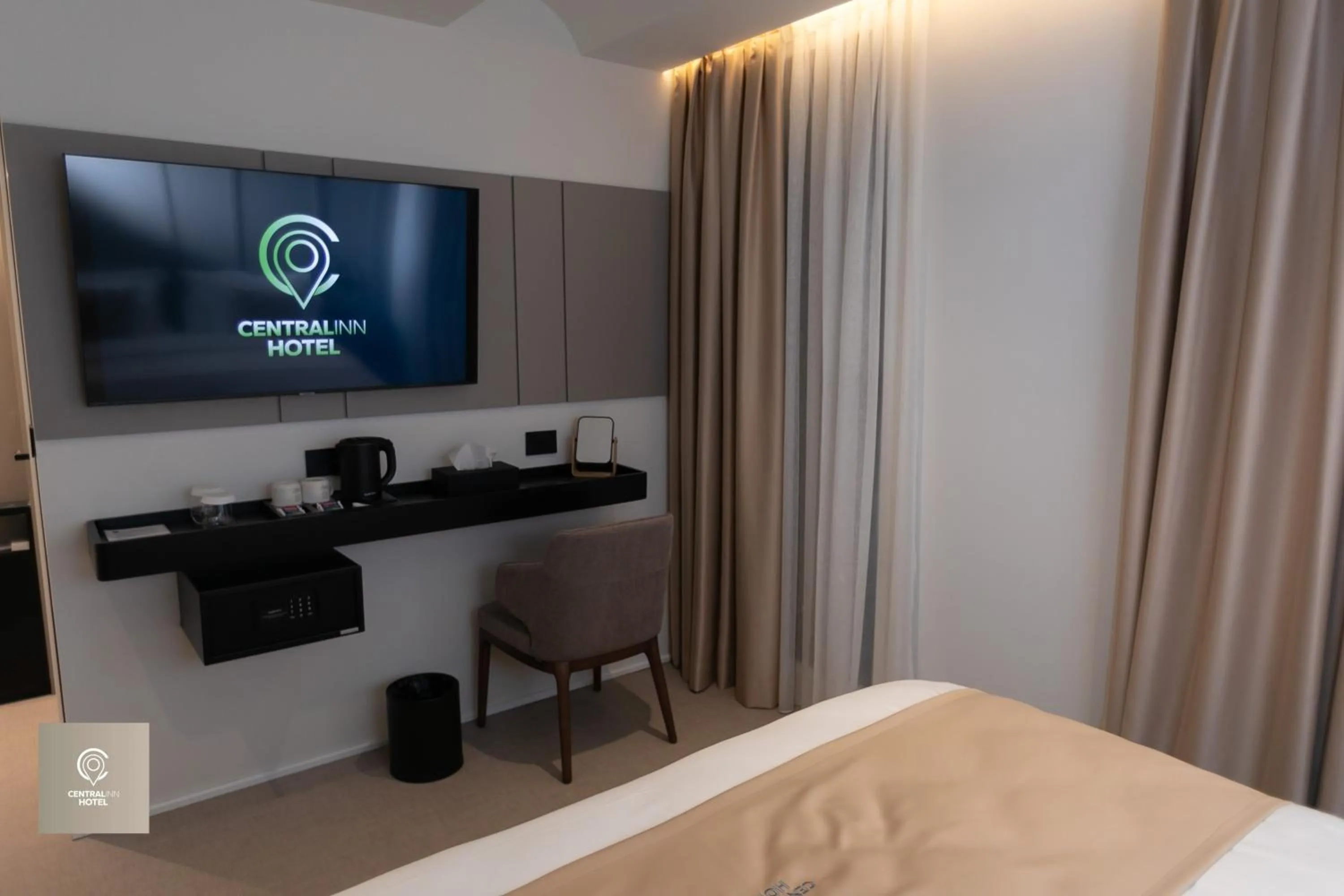 Bed in Central Inn Hotel