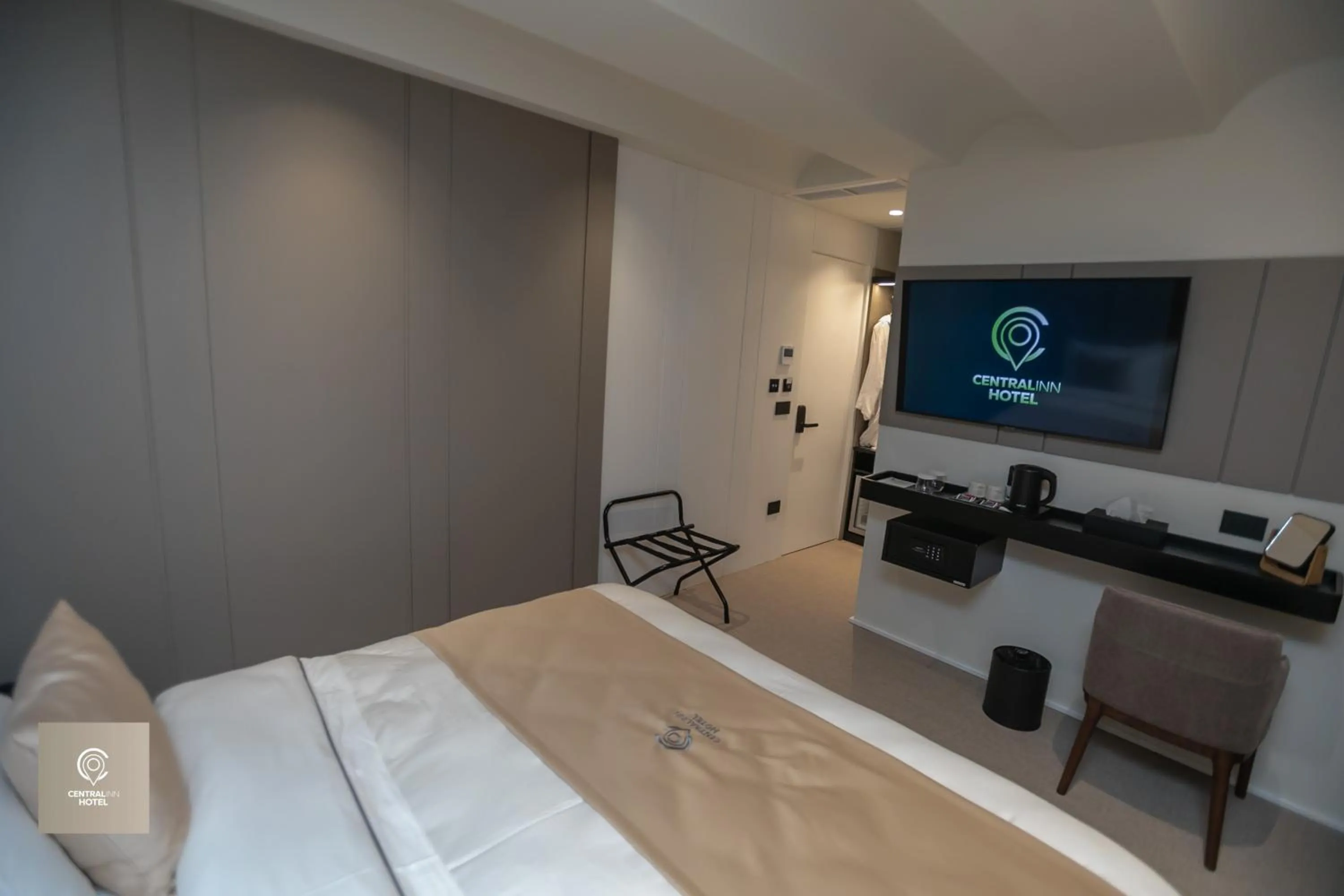 Bed in Central Inn Hotel