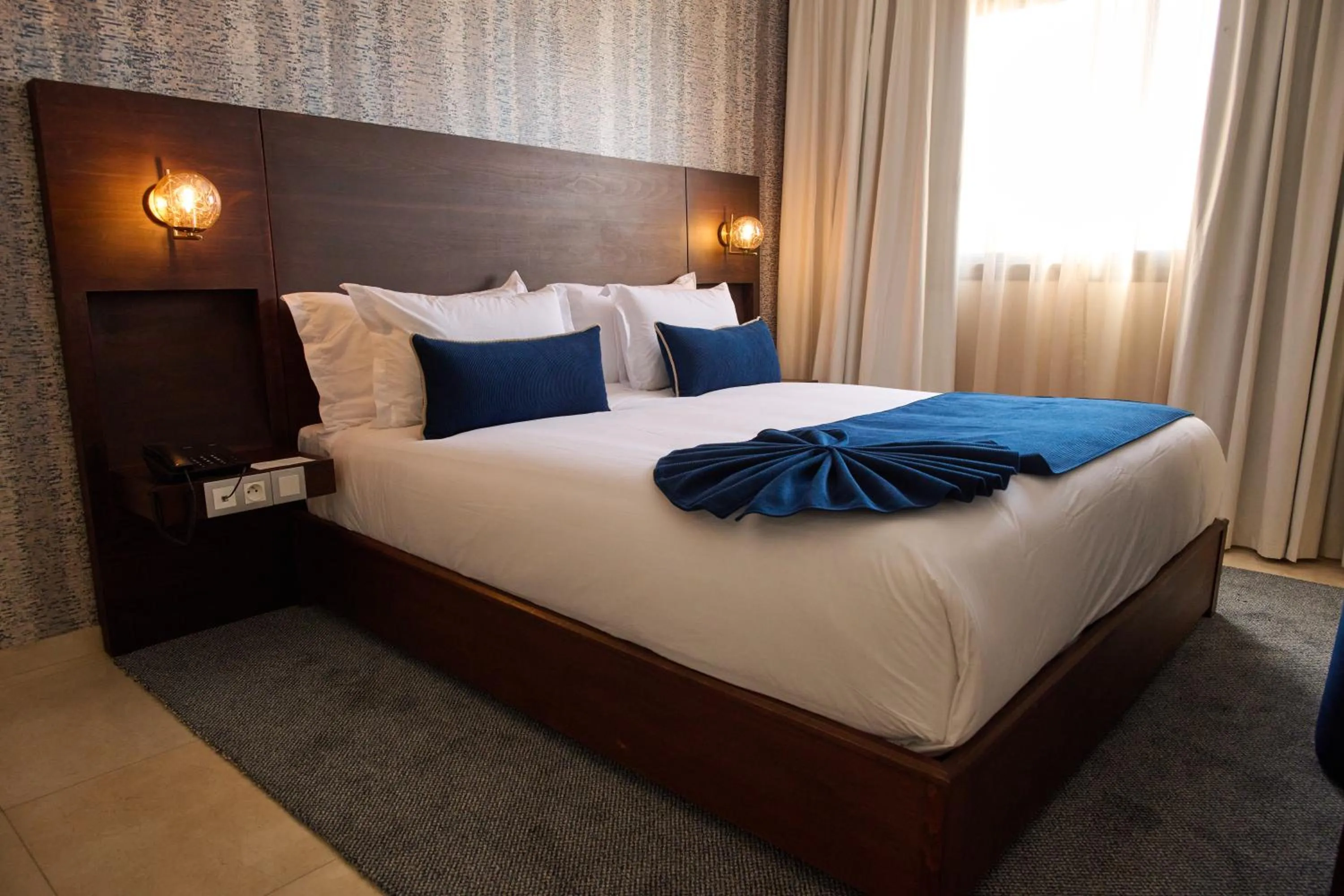 Bed in Fourteen Hotel Ain Sebaa