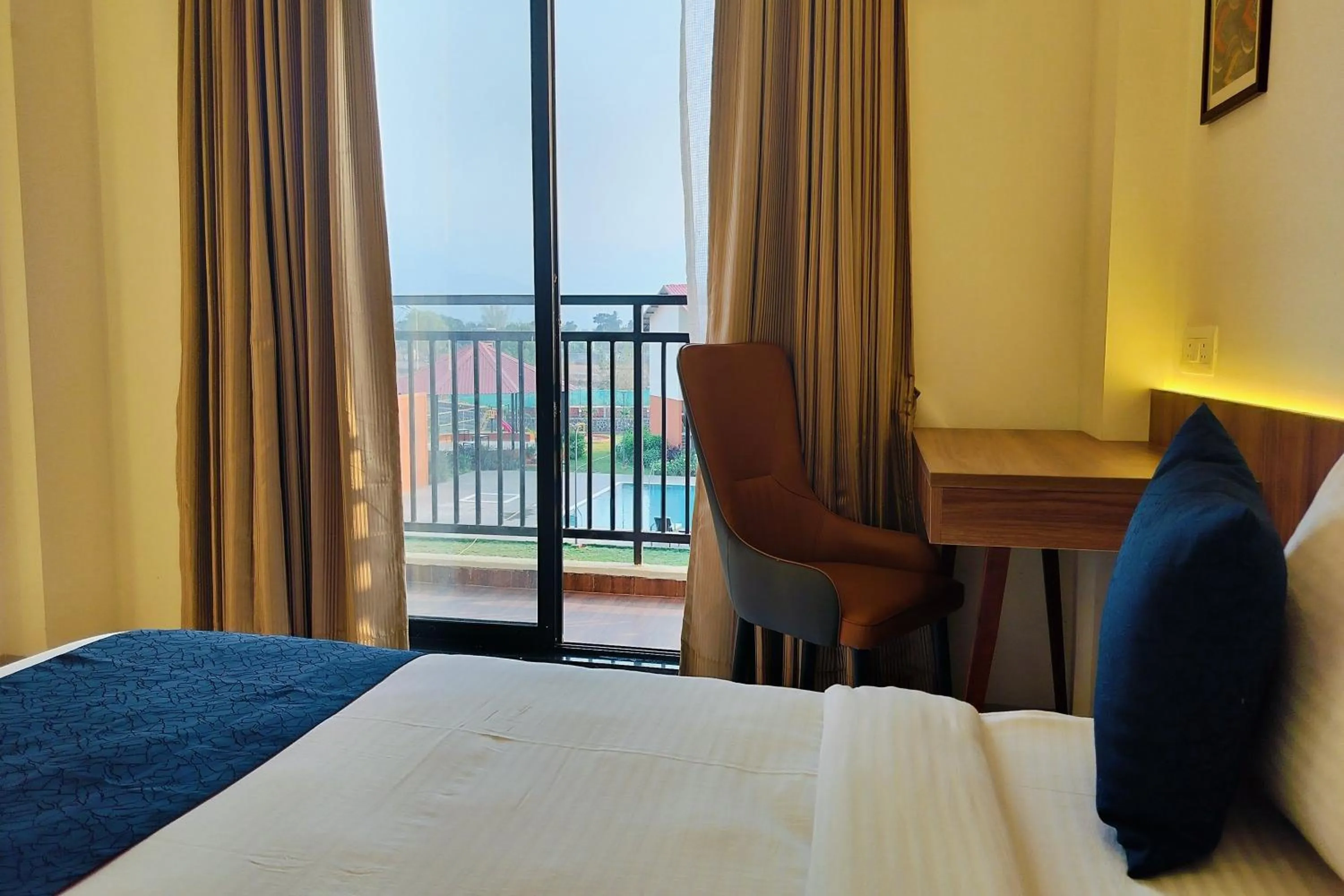 Balcony/Terrace, Bed in Pegasus Lifestyle Resort Karjat