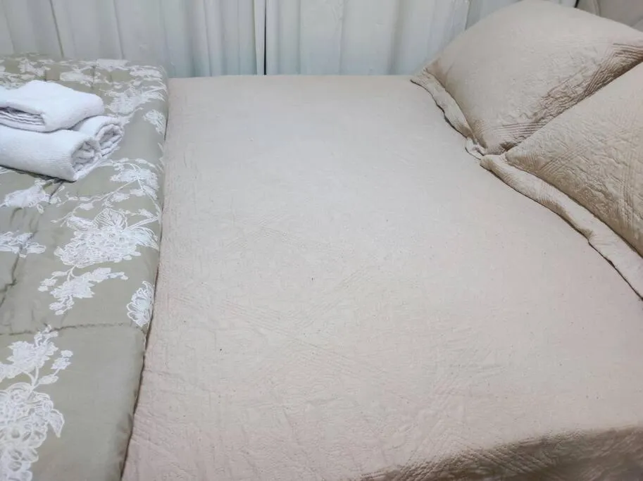 Bed in Fabuloso Apartamento central em Curitiba