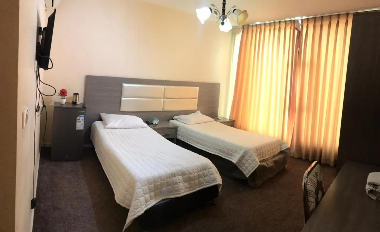 Bed in Alfares Hotel