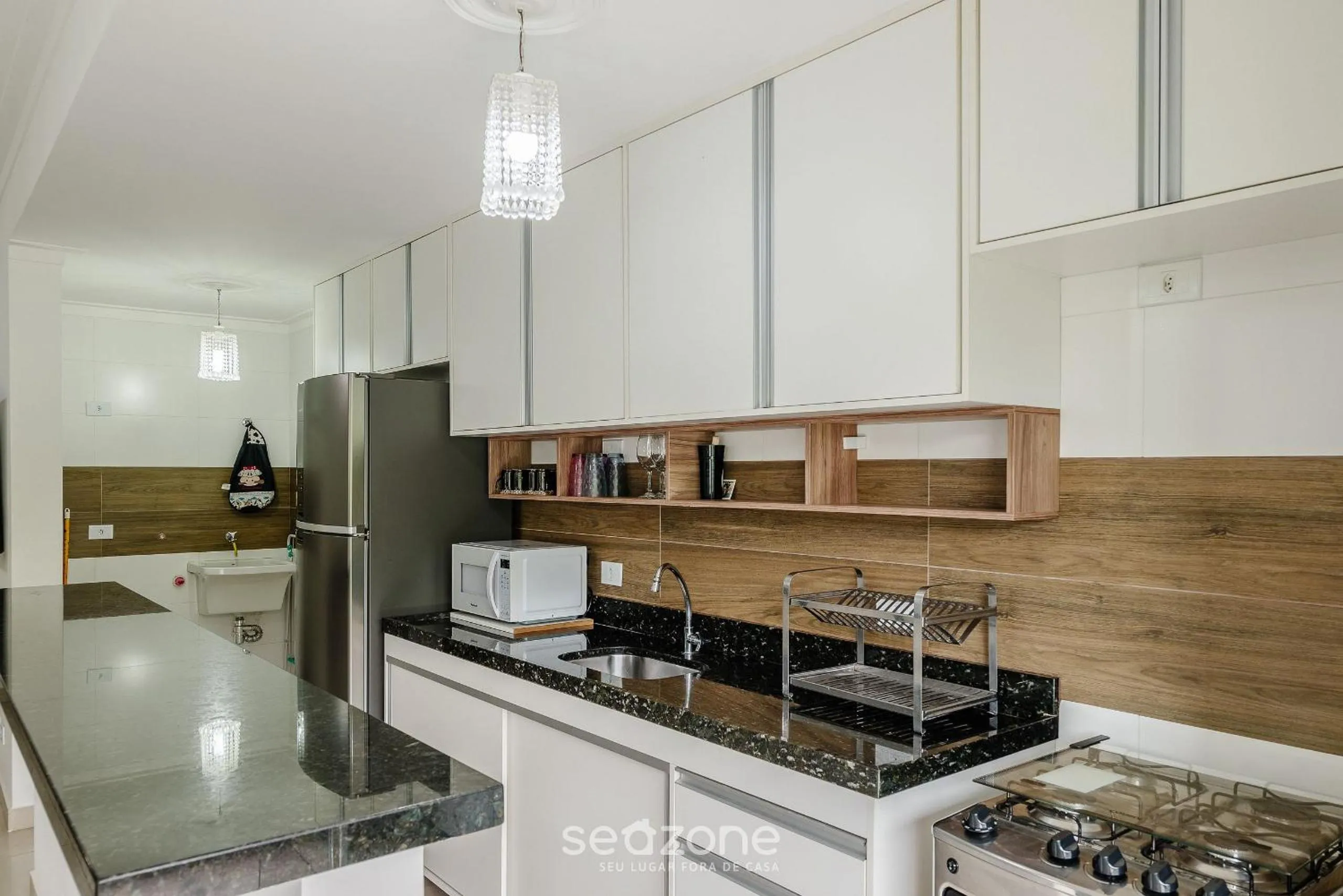 Kitchen or kitchenette in RJI - Apartamentos próximos da praia de Itaguá