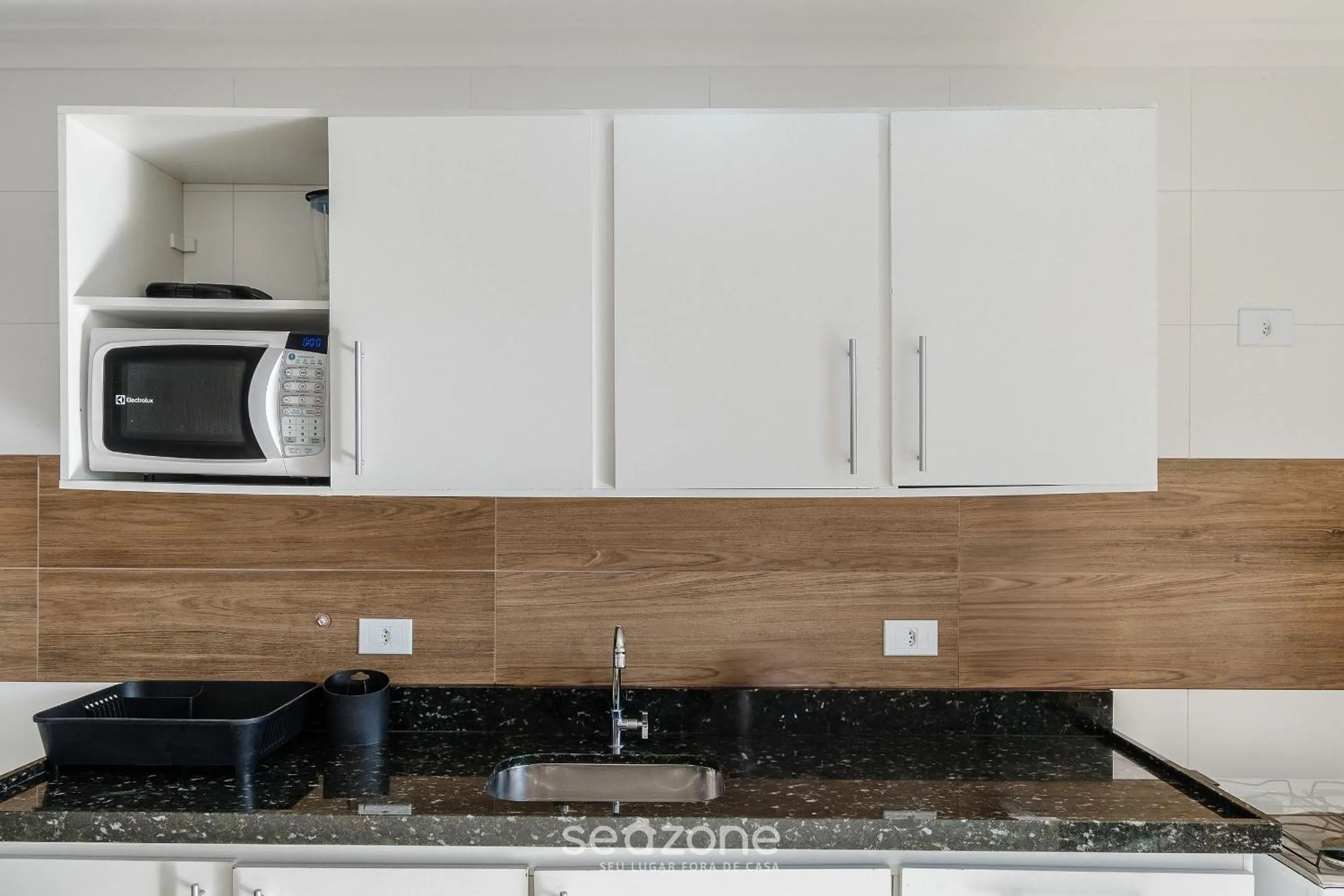 Kitchen or kitchenette in RJI - Apartamentos próximos da praia de Itaguá