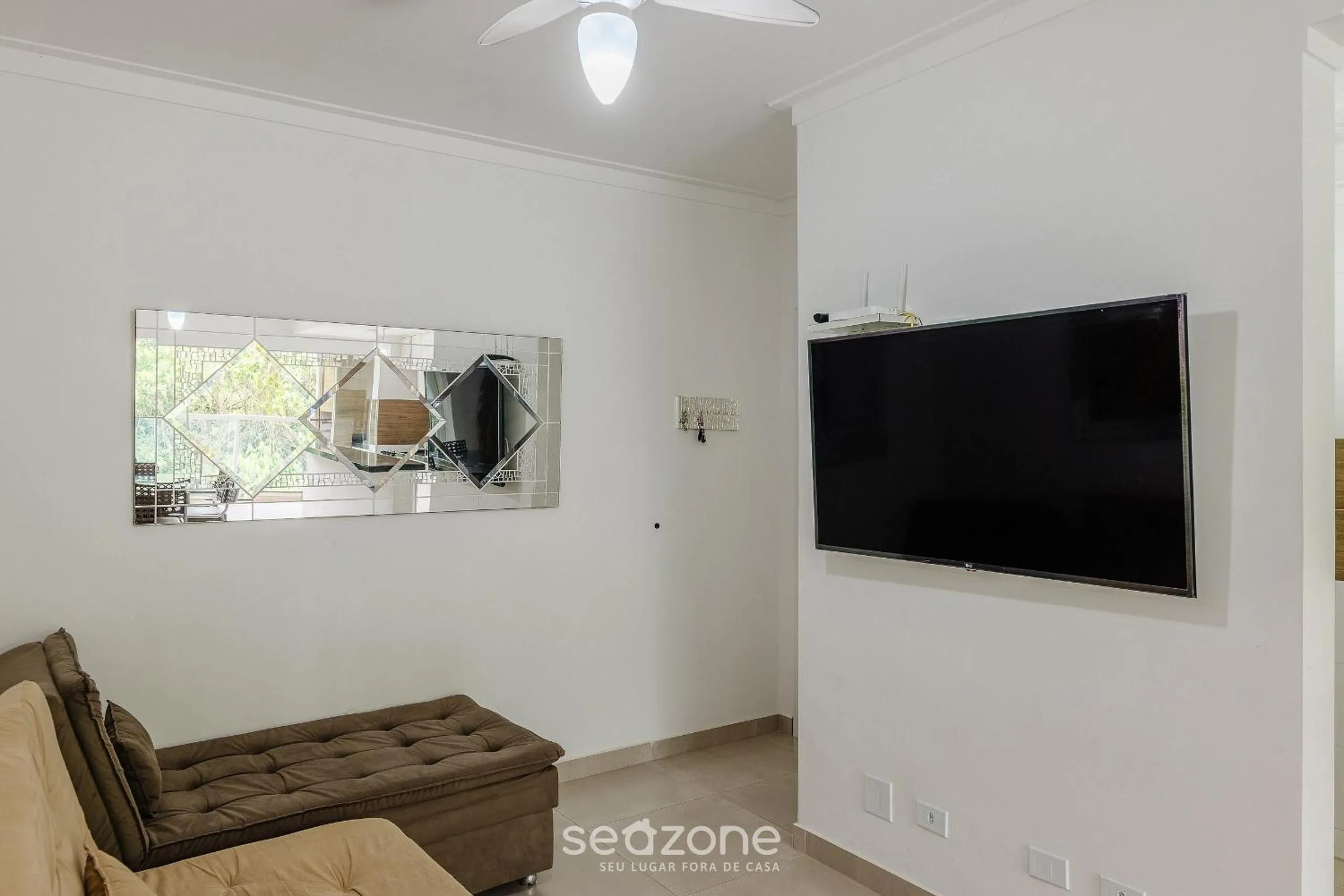 Living room in RJI - Apartamentos próximos da praia de Itaguá