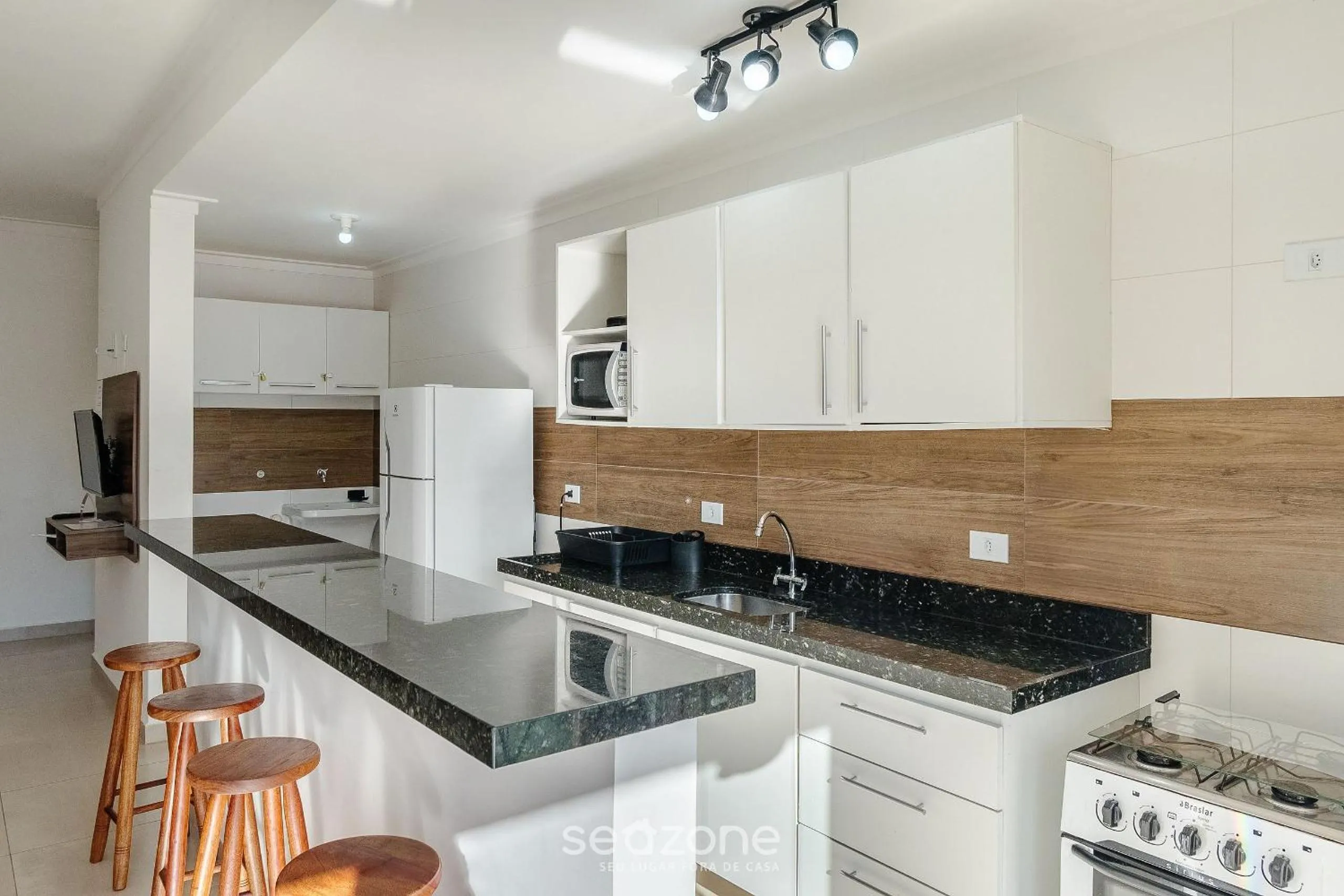 Communal kitchen in RJI - Apartamentos próximos da praia de Itaguá