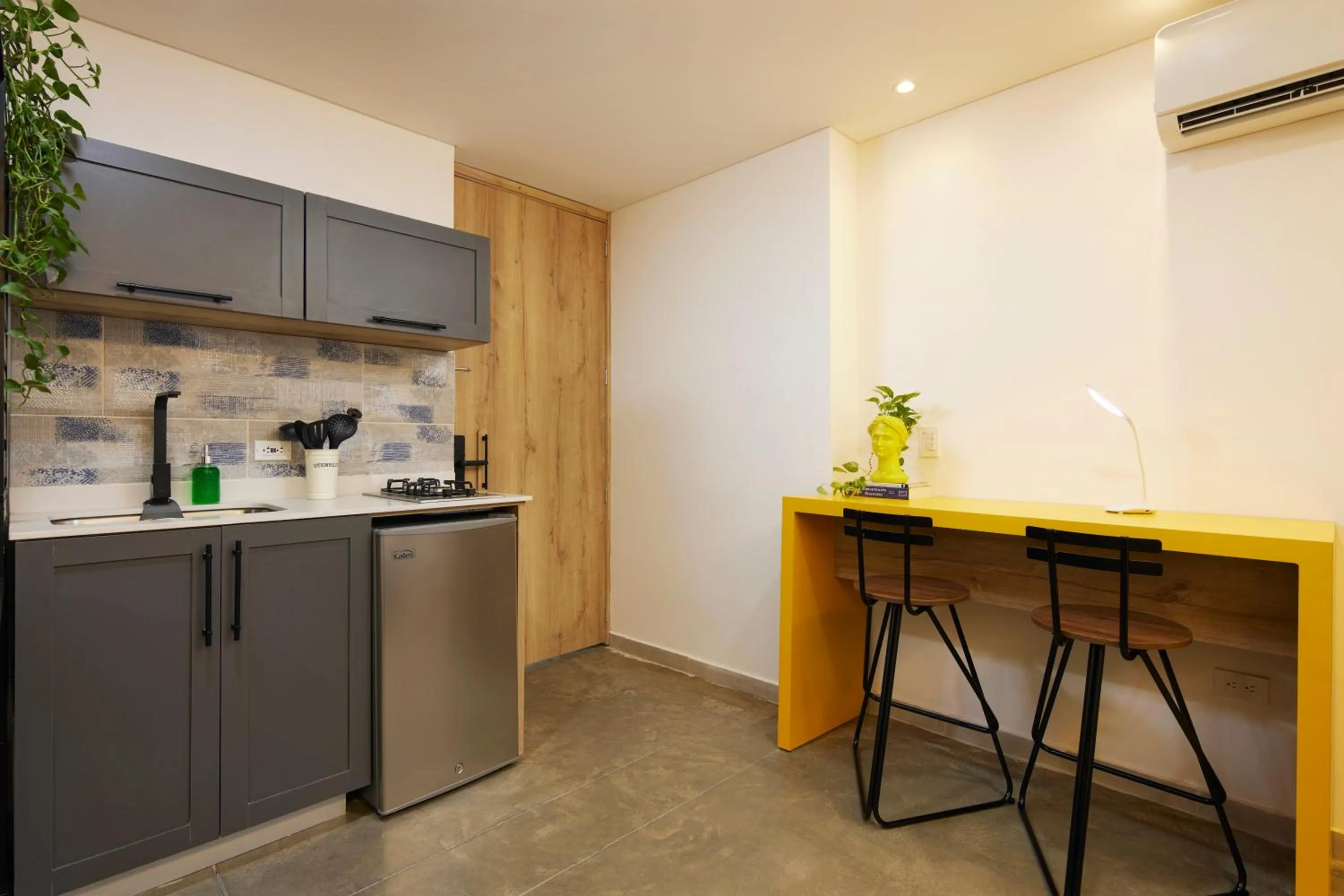 Kitchen or kitchenette in Altio Hotel
