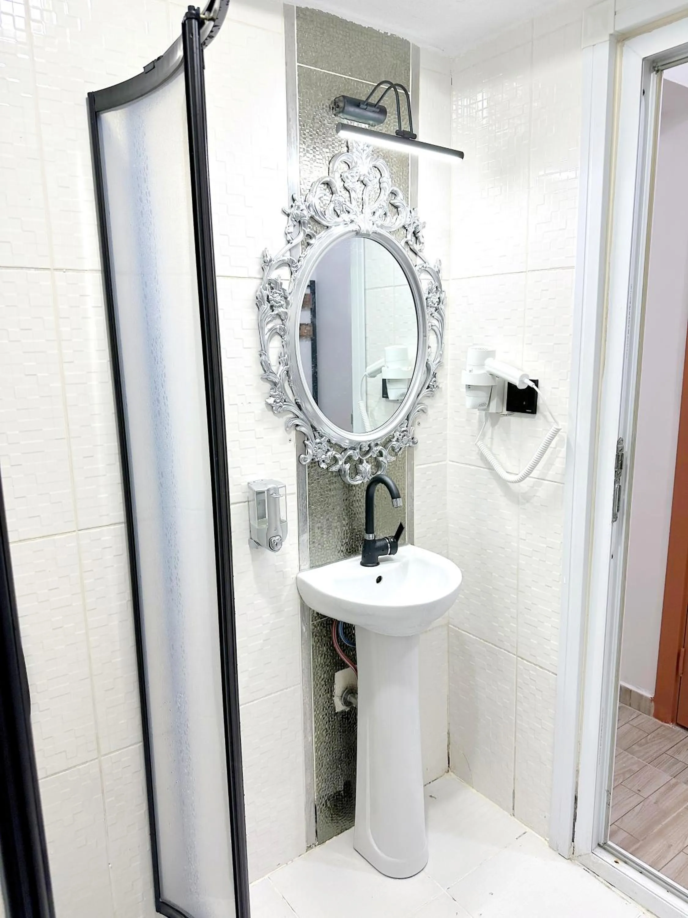 Shower in Menesa Hotel