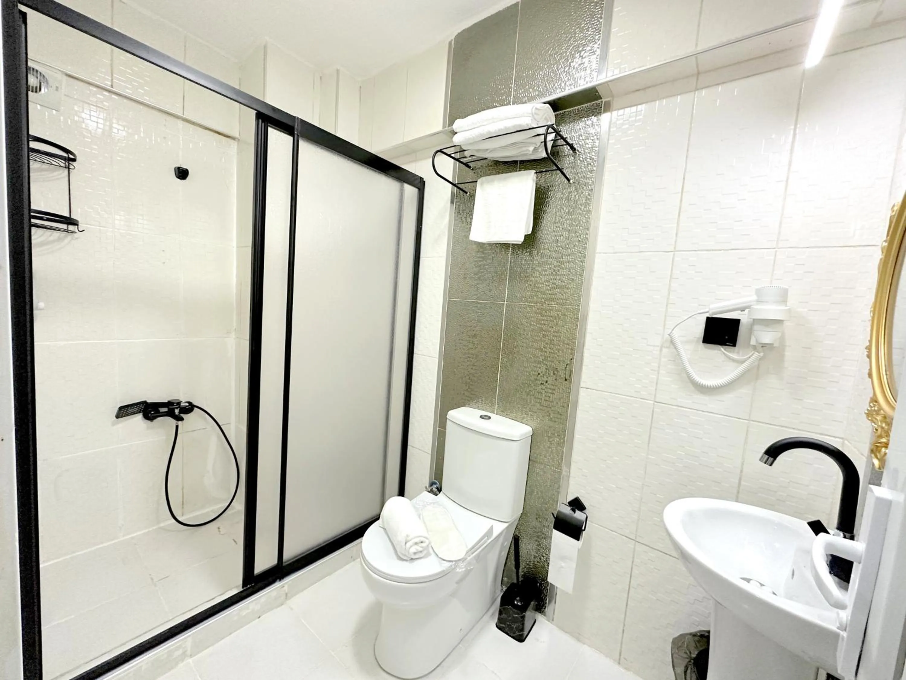 Shower in Menesa Hotel